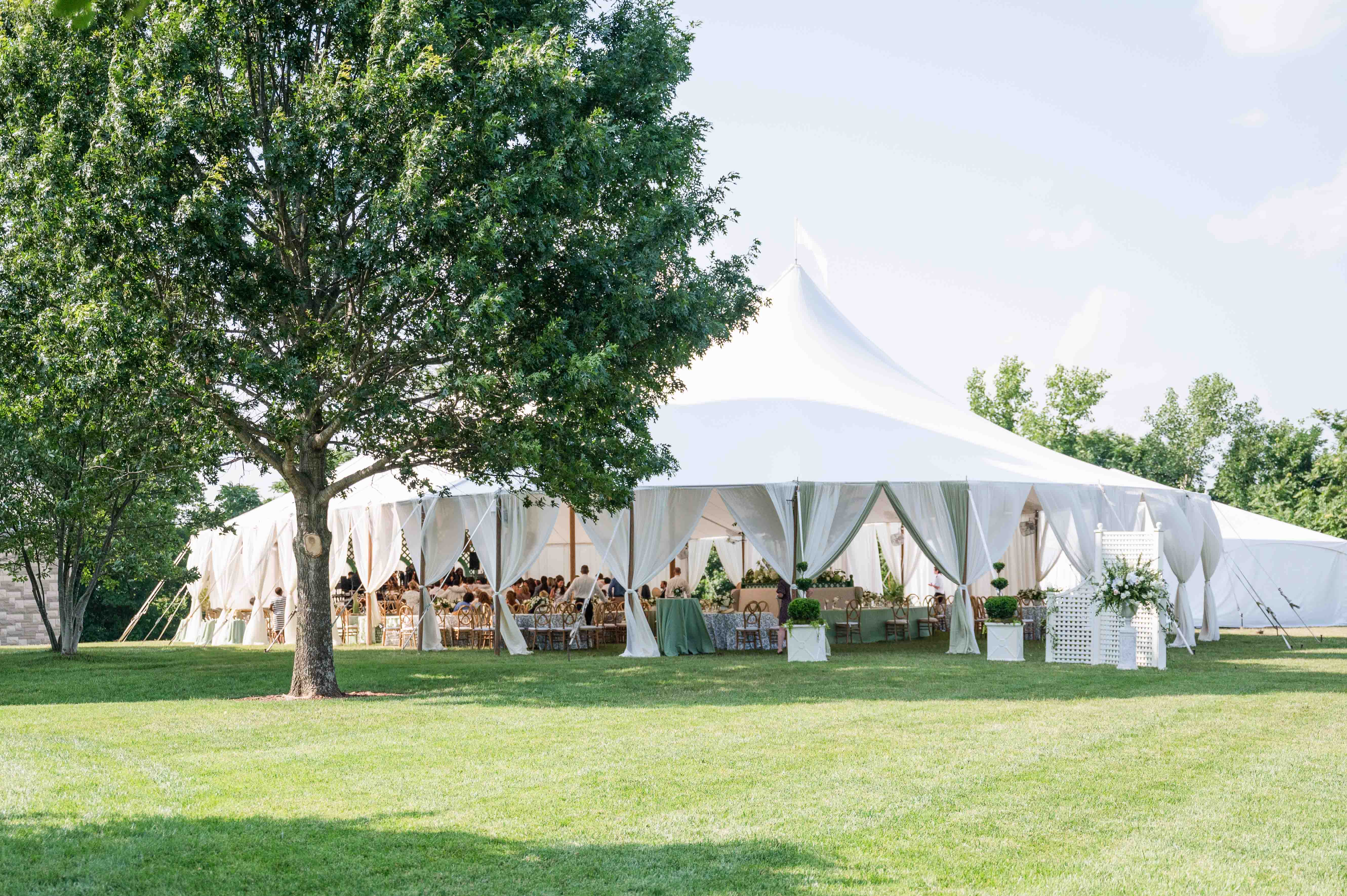 Image of wedding sail tent on a summer day.