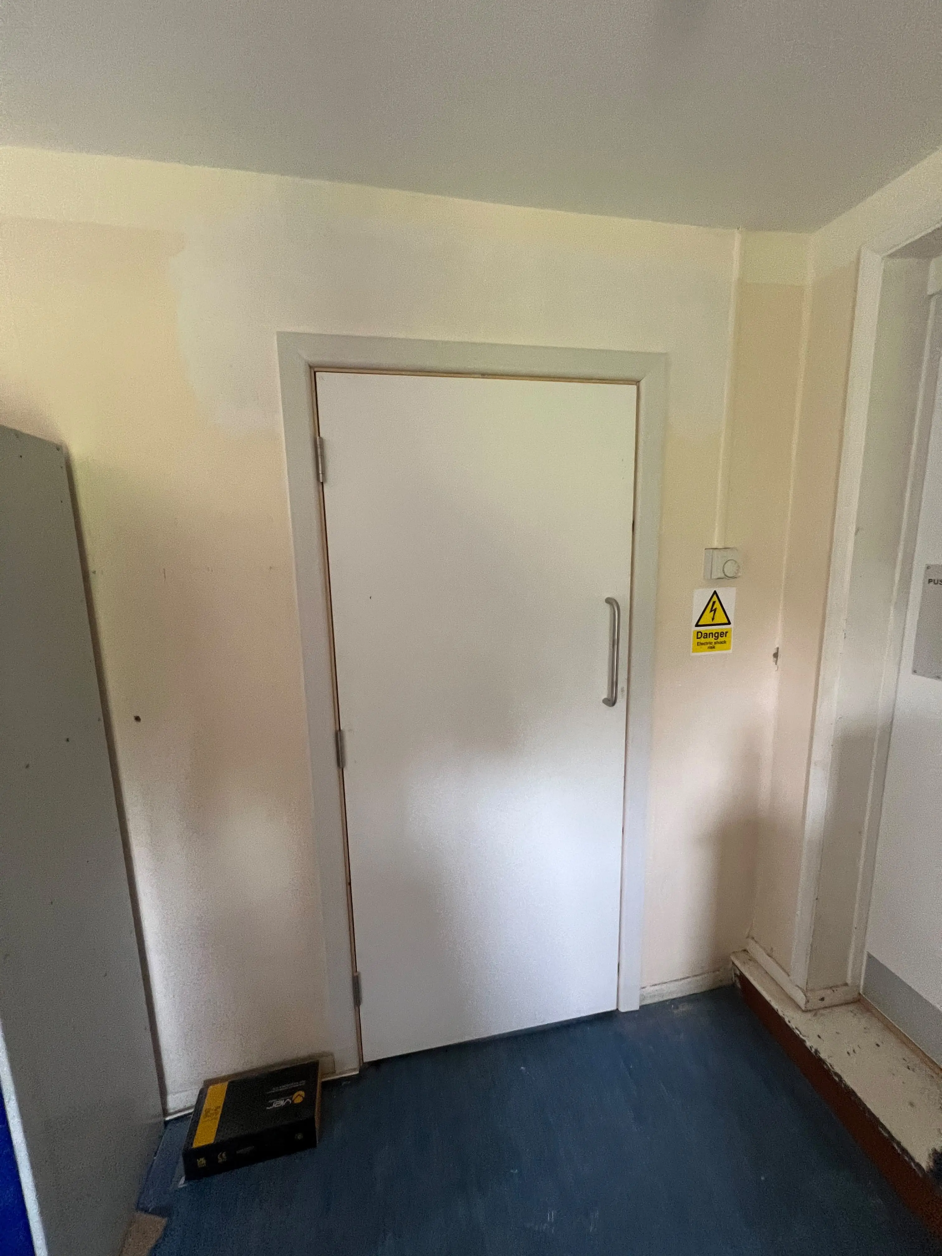 White fire door post maintenance in London