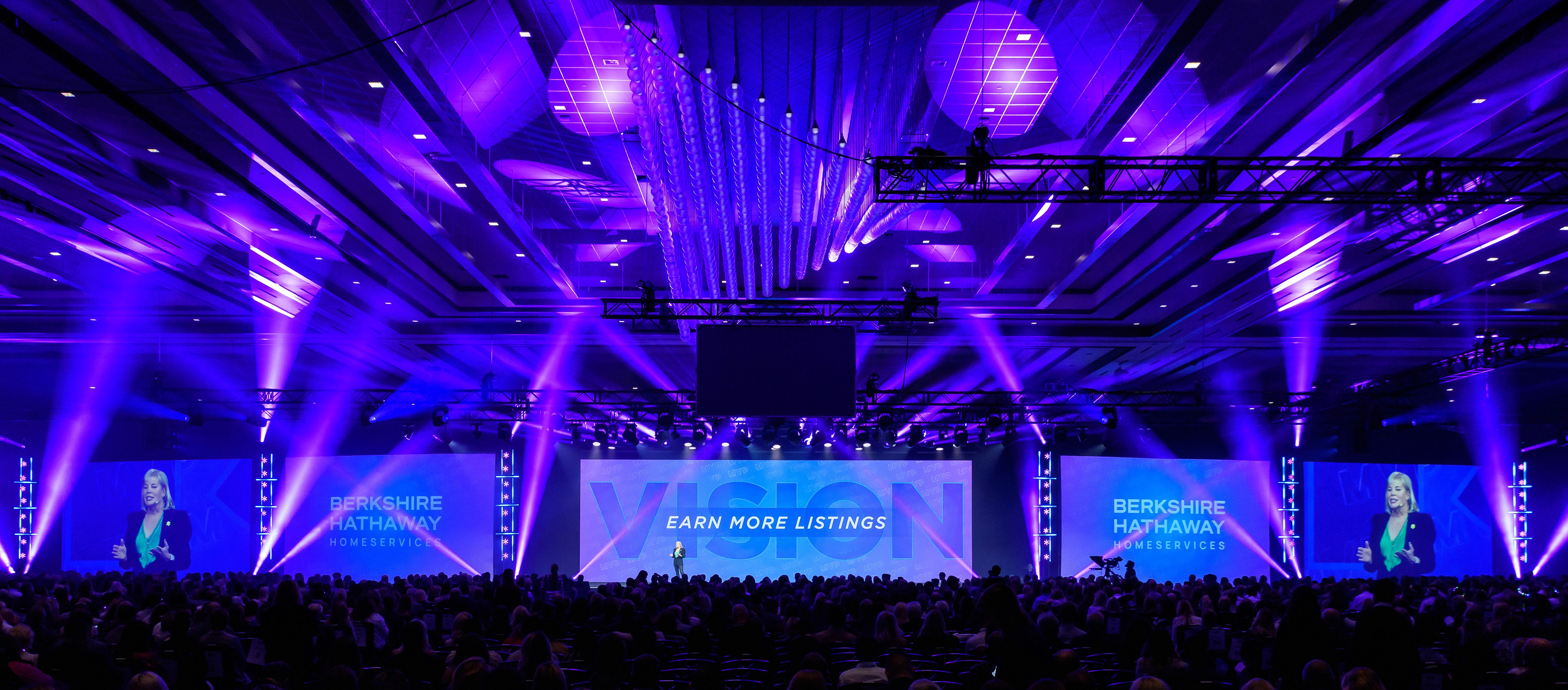 Berkshire Hathaway HomeServices Las Vegas Sales Convention staging with blue lighting