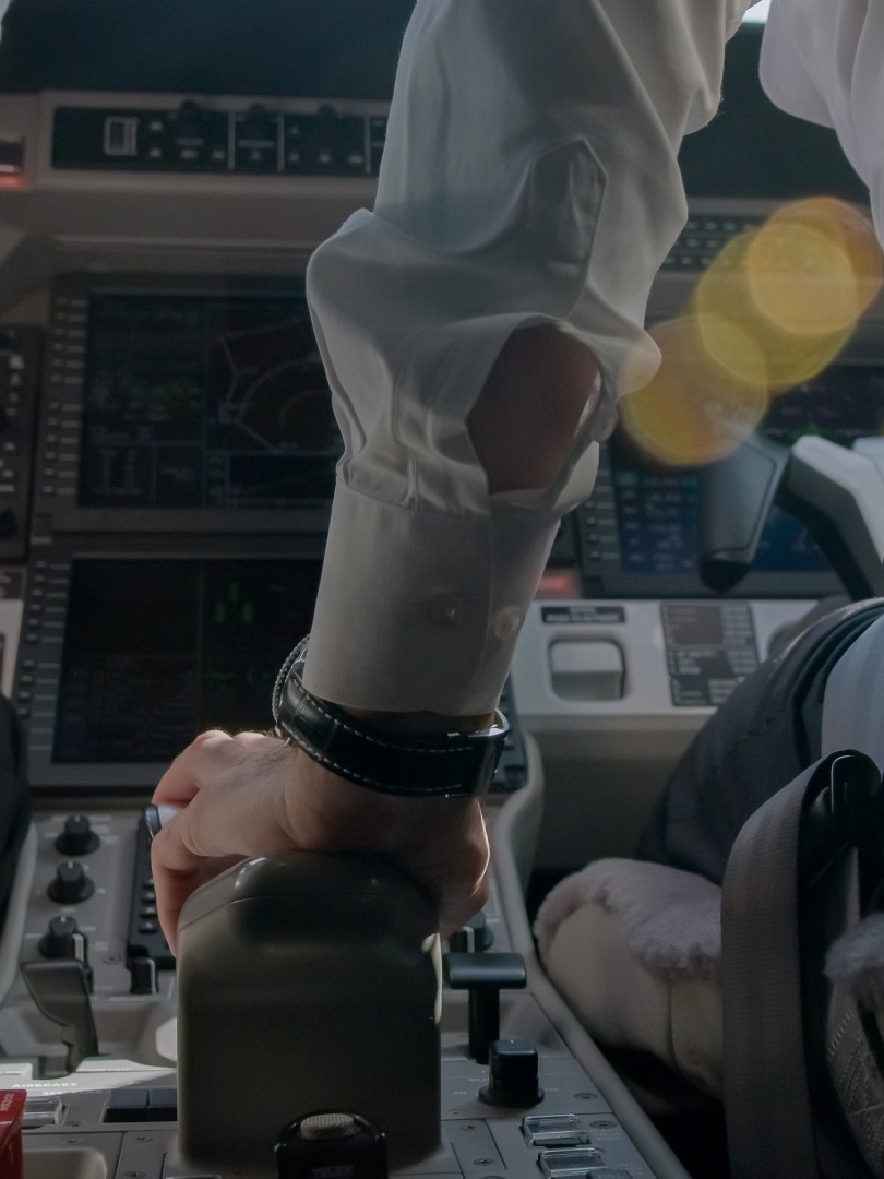 Closeup of pilots flying a Pilatus aircraft