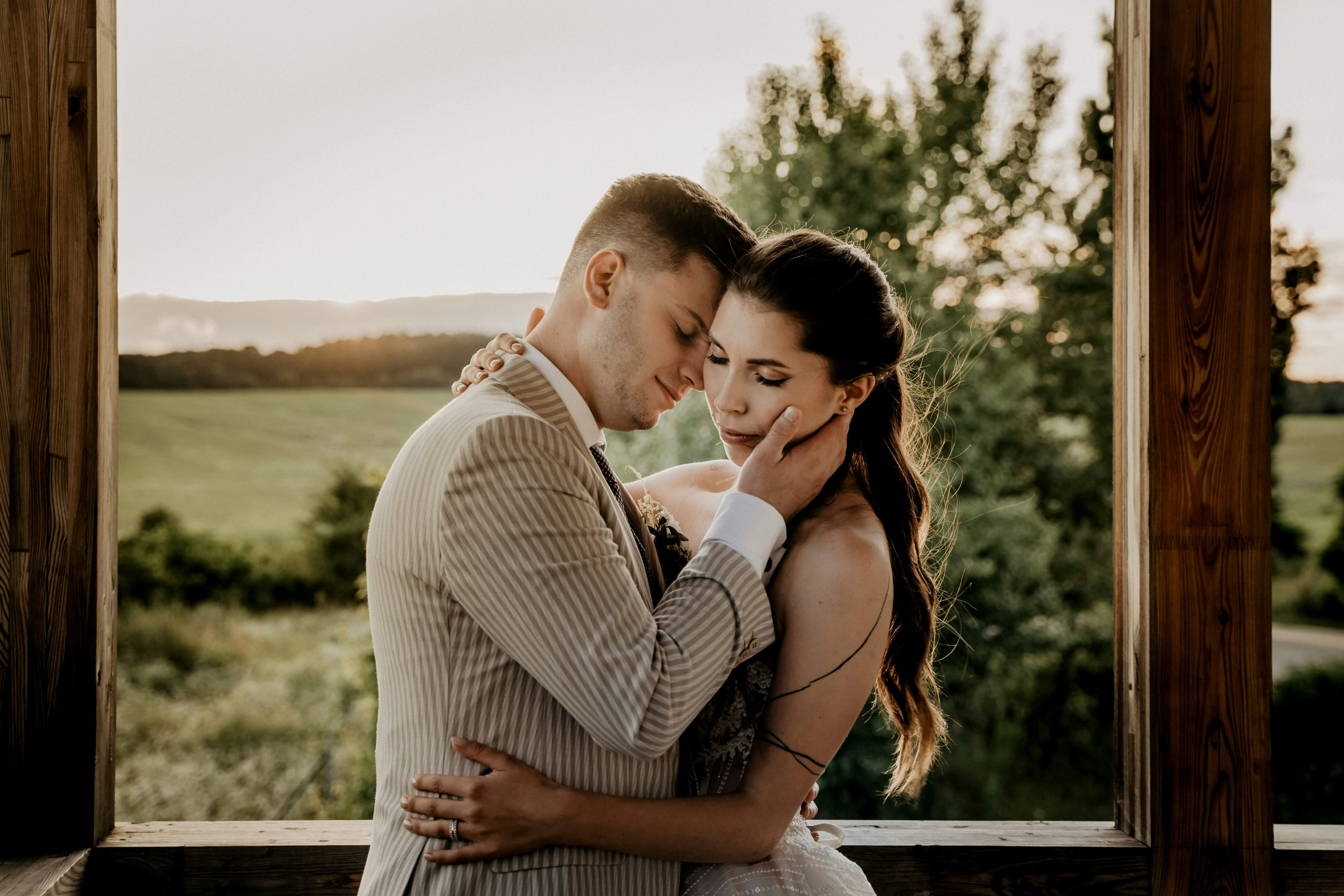 Couple holding one another