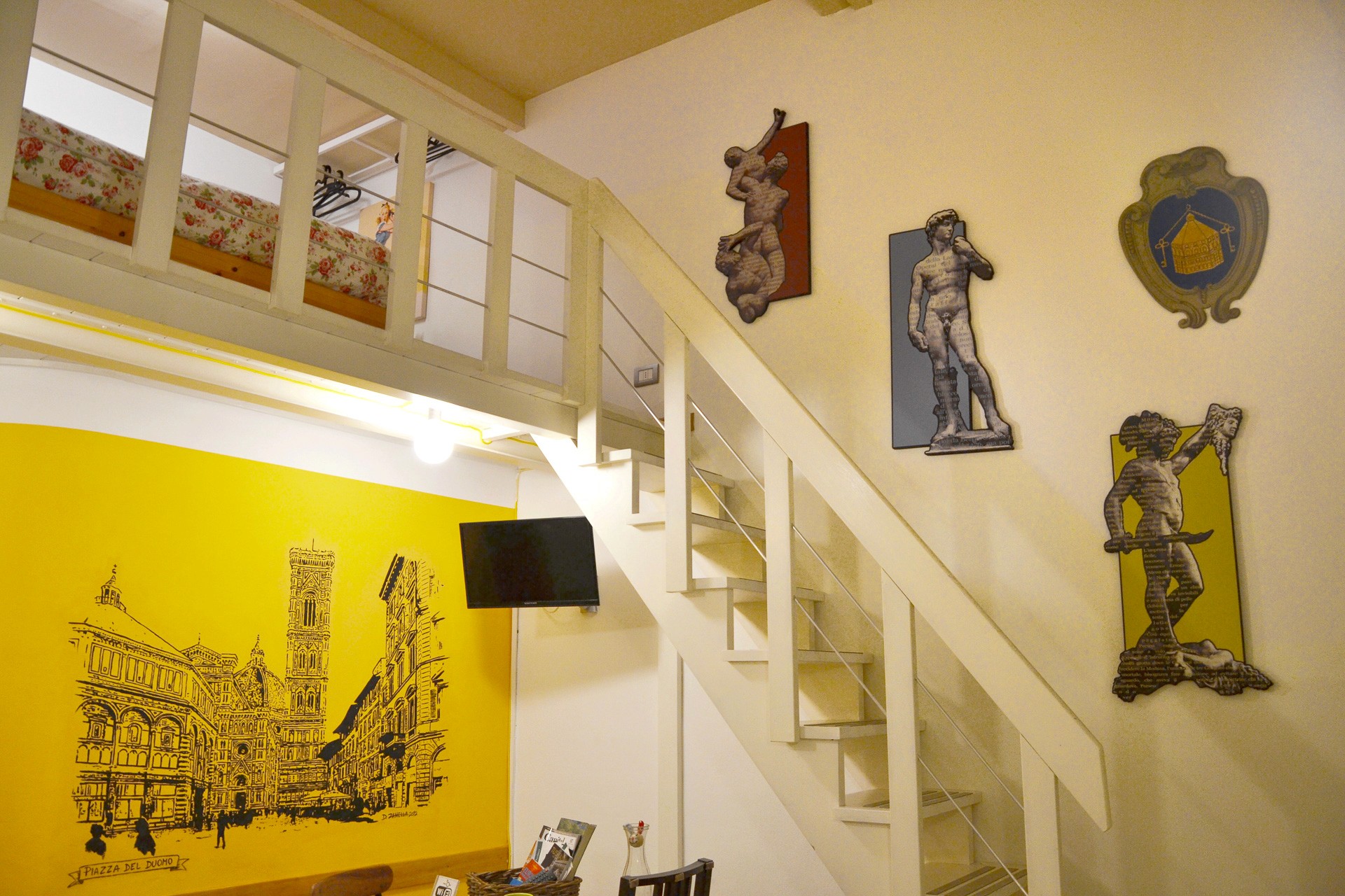 Immagine delle scale che vanno nella camera, vista dal salotto