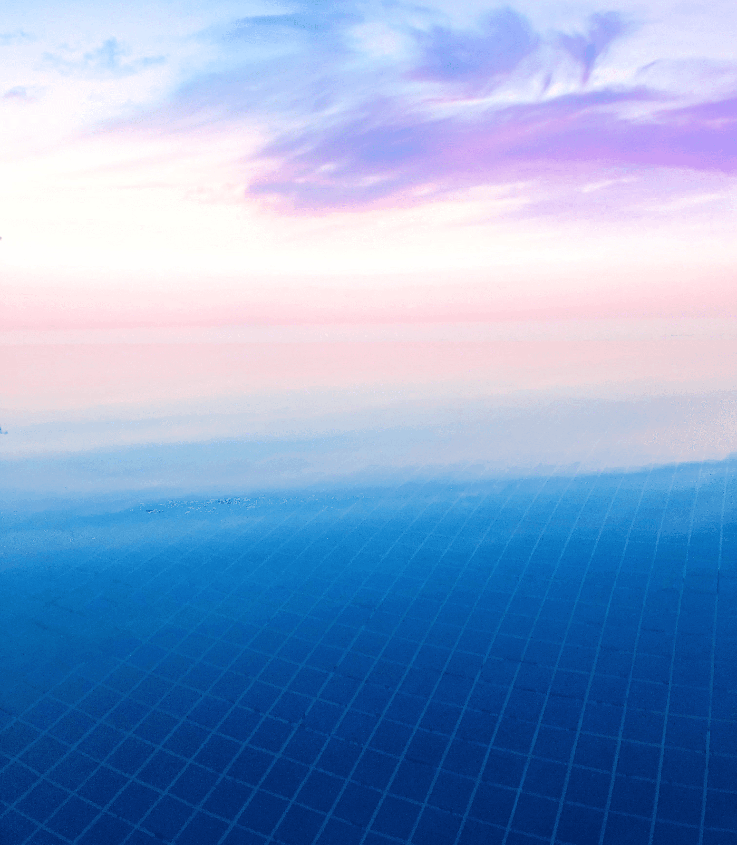 Professional working with focus and precision, representing AI-native advisory services that turn human expertise into scalable performance.