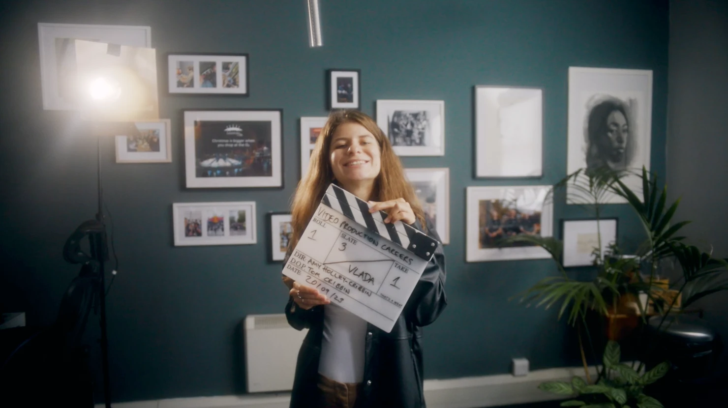 Video Crew holding a clapperboard on a shoot