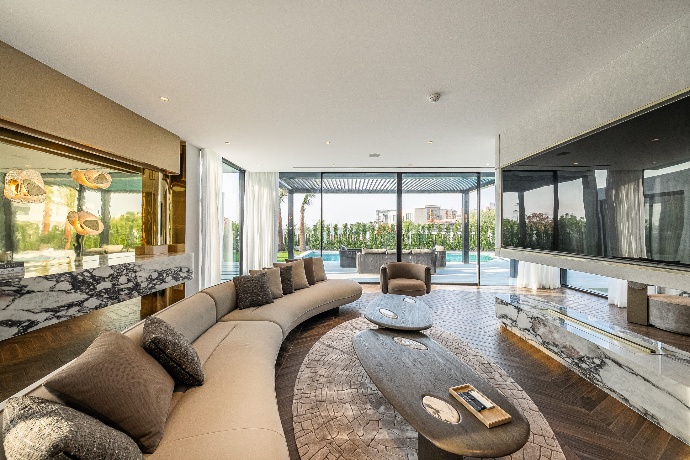 Image of a large villa with big glass windows