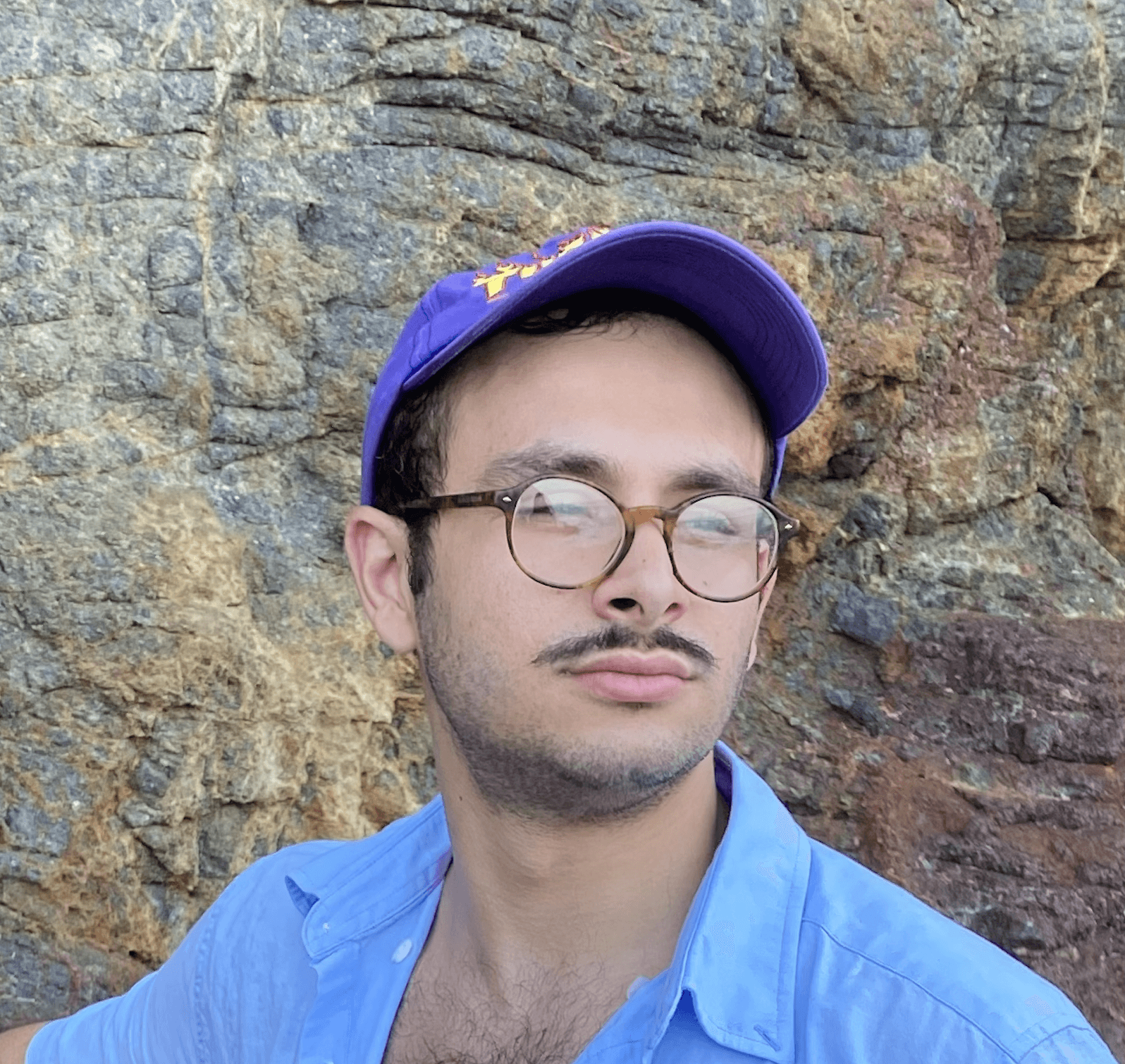 A portrait of a young man smiling