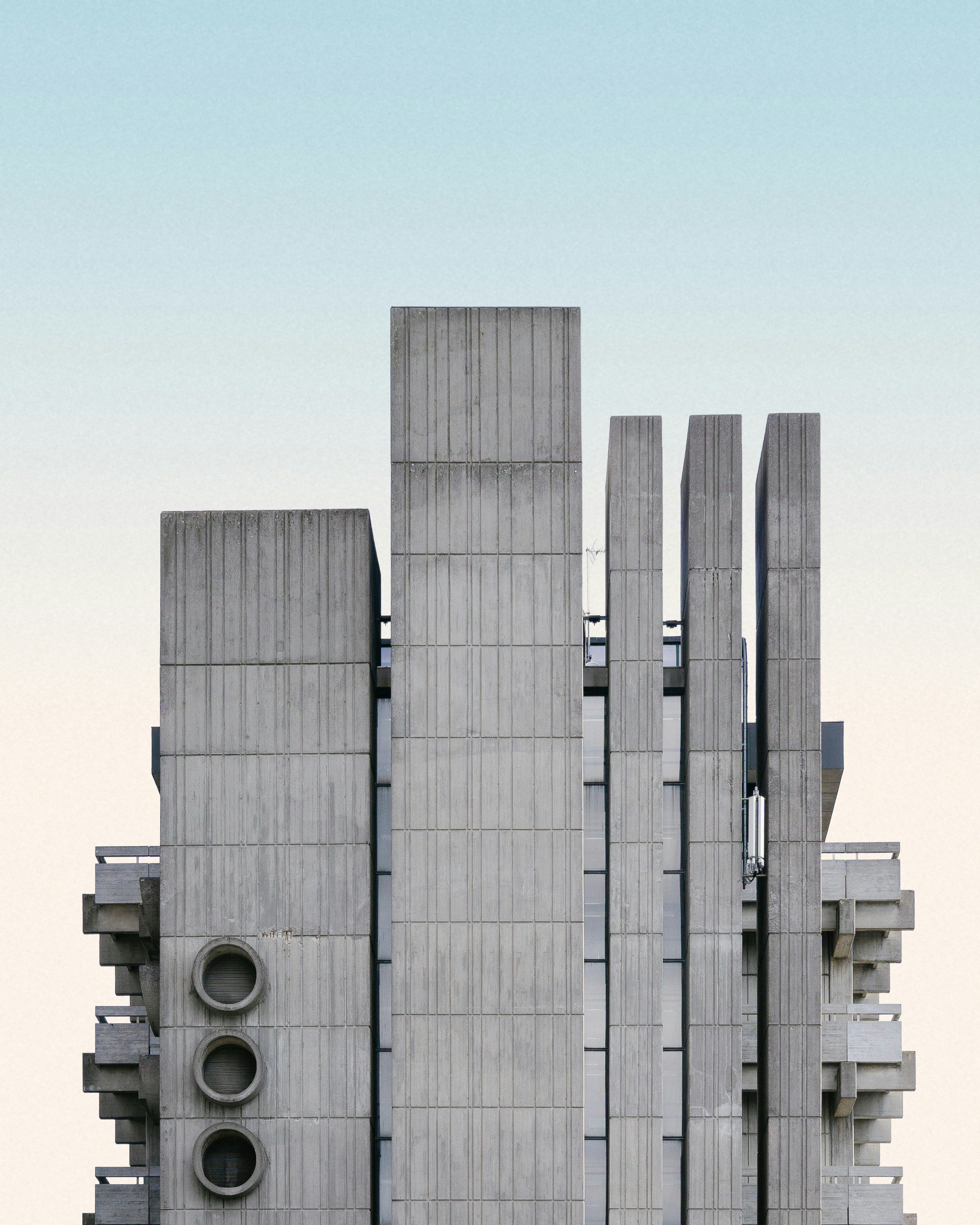 Cover image for Issue 04, "Brutal Beauty", showing brutalist concrete architecture.