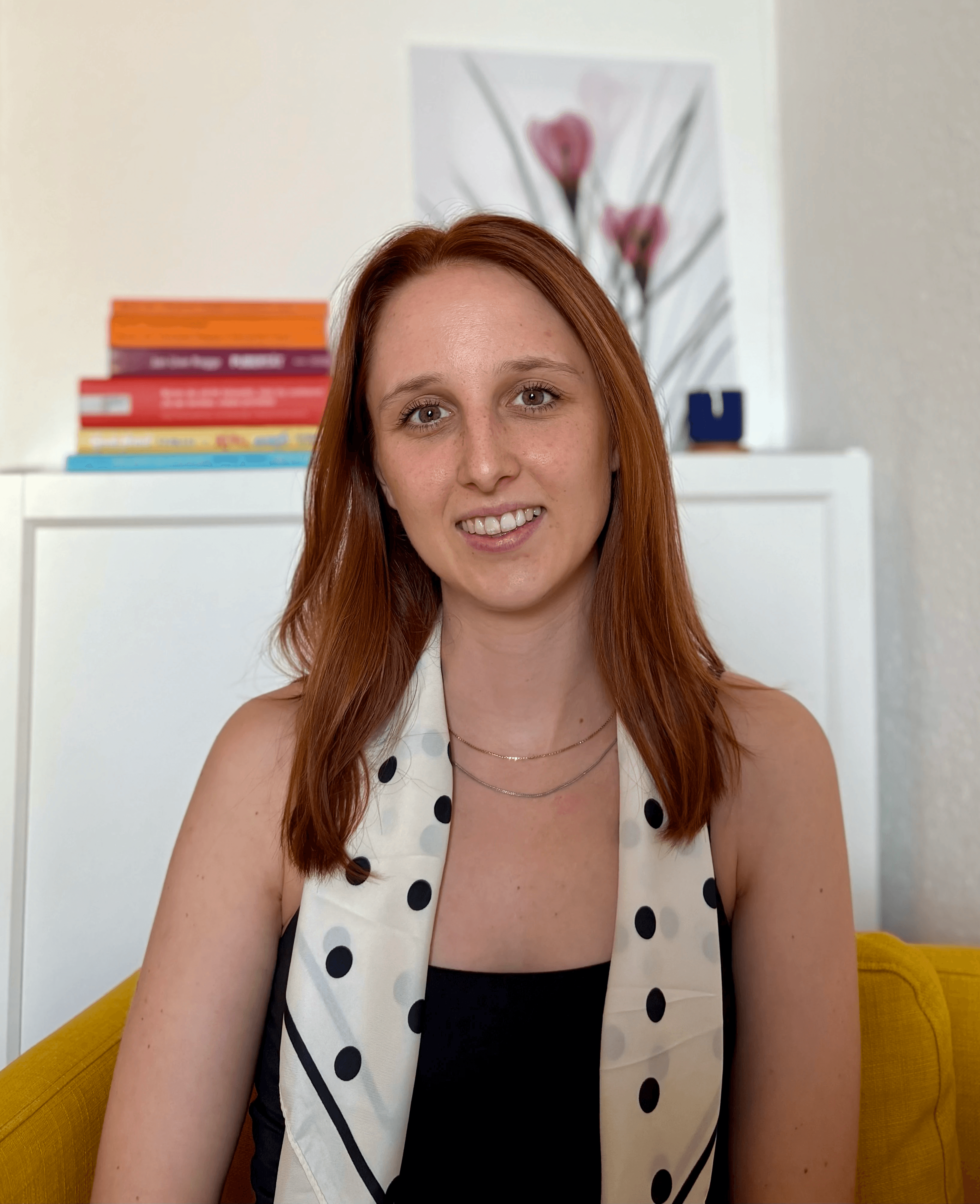 person sitting in a chair in front of a man