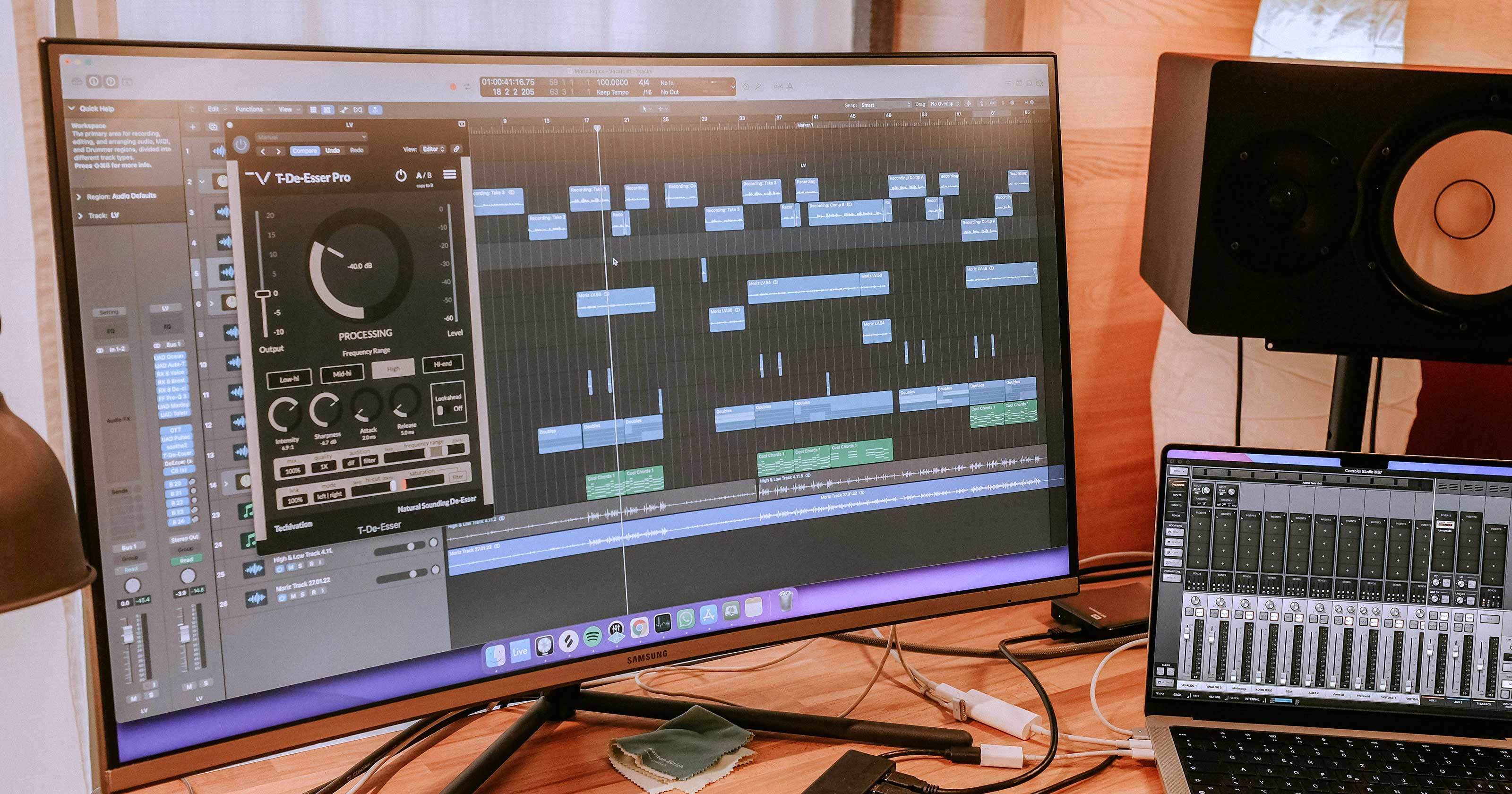 a digital audio workstation with a monitor showing the music software