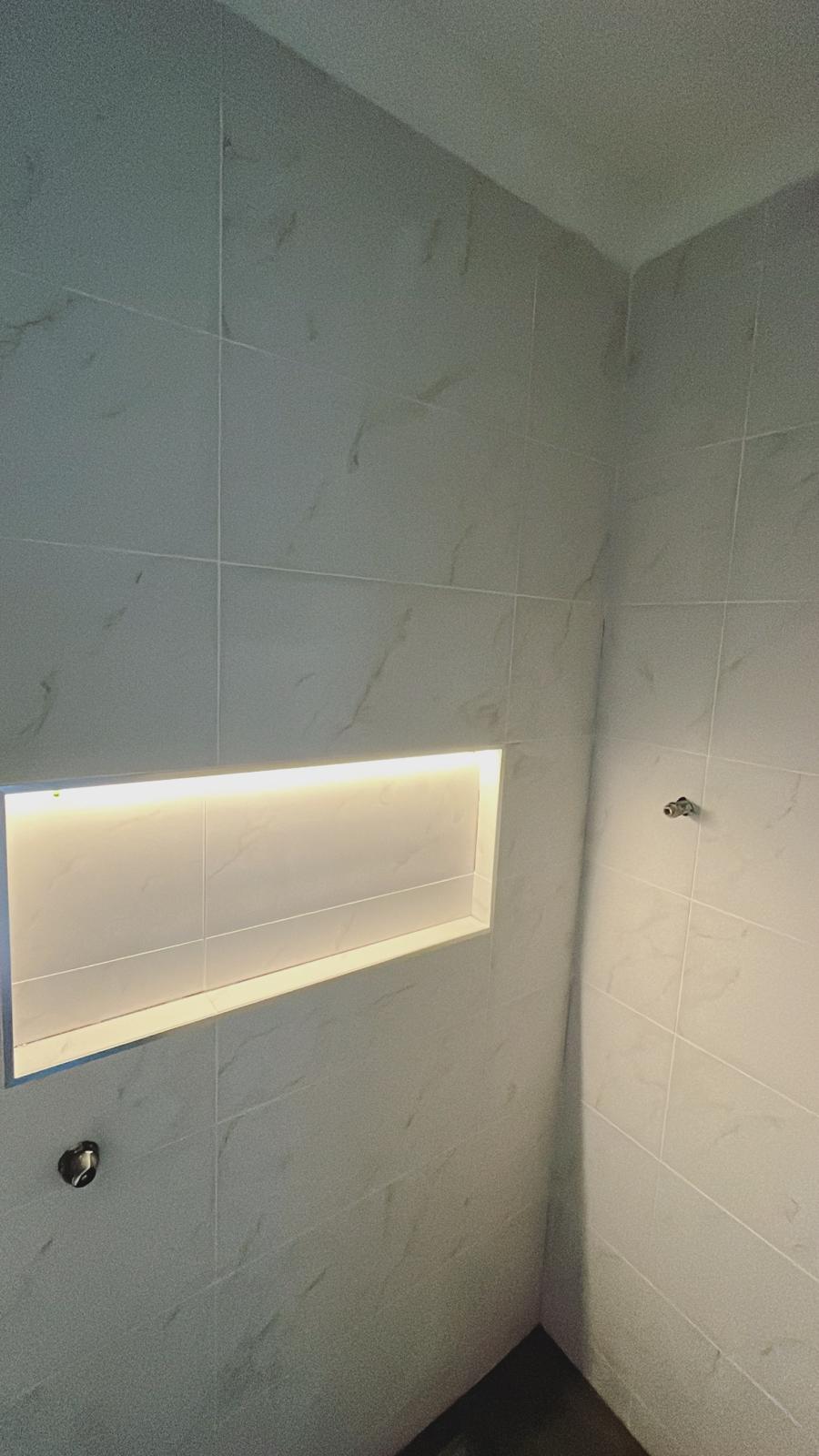 Ohana plumbing clearing a blocked drain from the street.