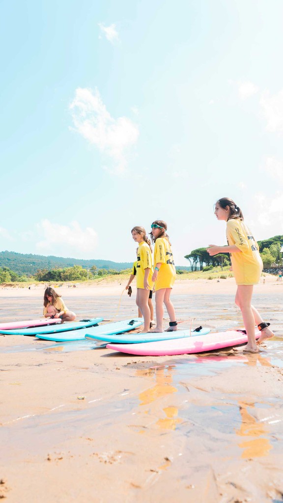 Surfer cleaning Surf board