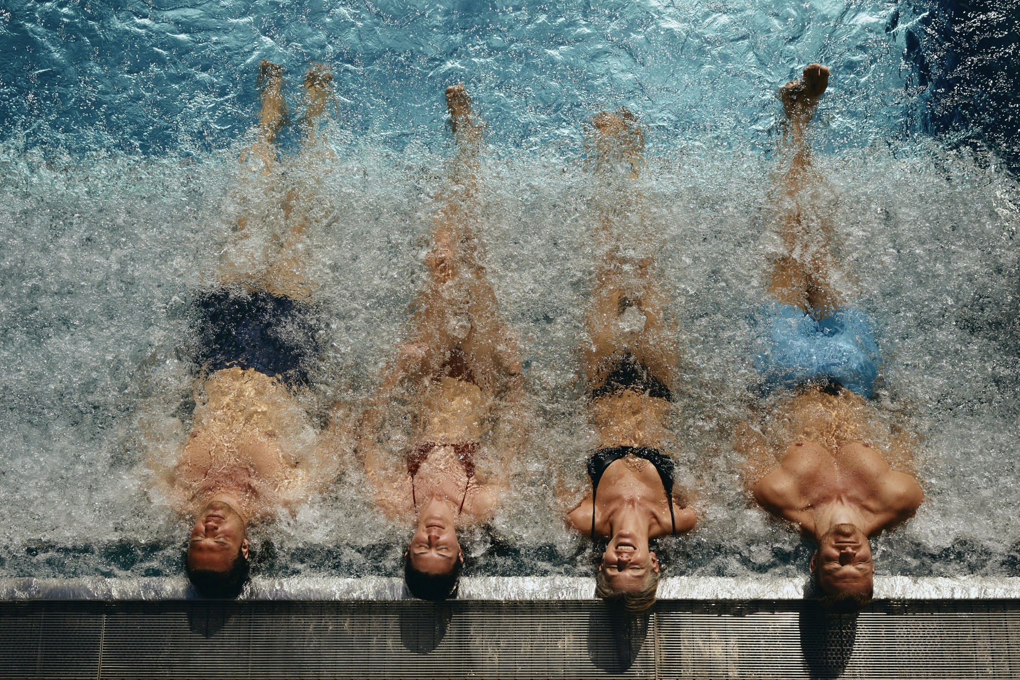 Streetside billboard with flyposters of the Batch.Works brand and illustrations