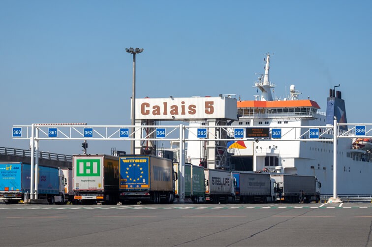 Freight trucks boarding a ferry at Calais port