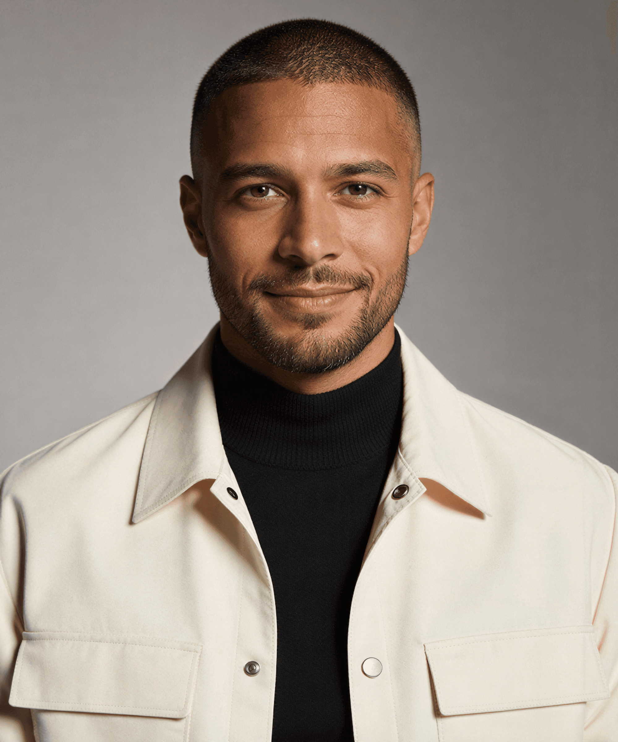 Professional portraits of three team members displayed in a team section