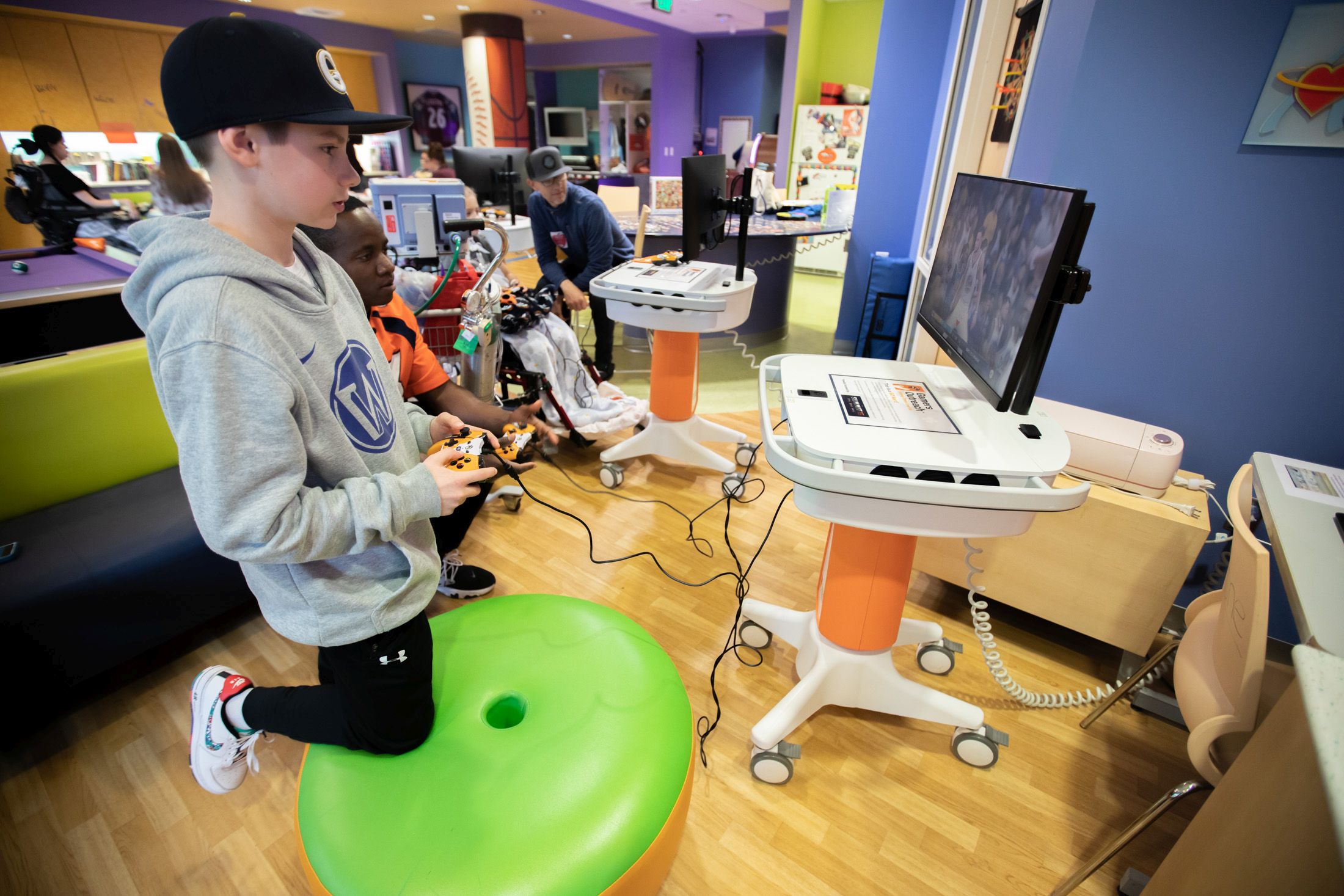 Joe Jones of the Denver Broncos visits Children's Colorado