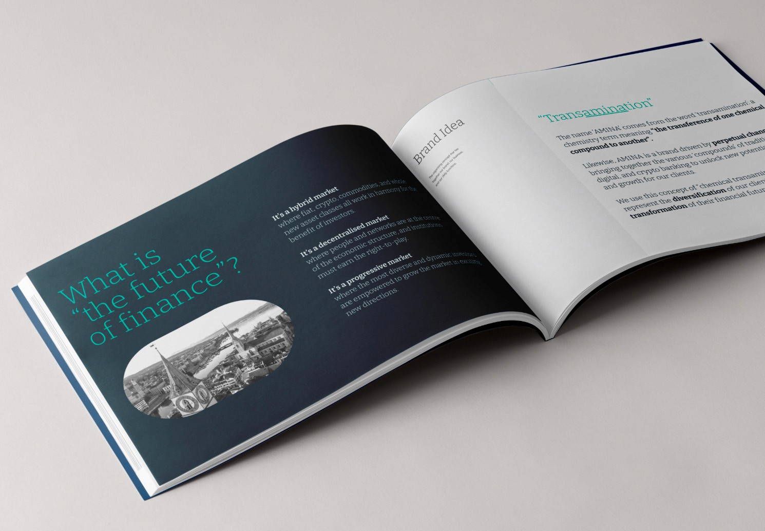 a person holding a cell phone in front of a laptop