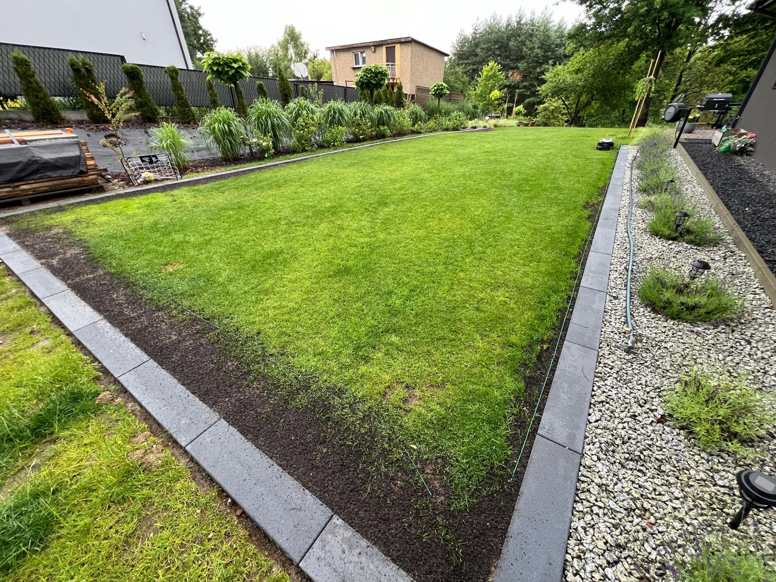 Beautiful landscaped garden with greenery and outdoor design elements.