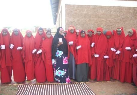 selective focus photography of girl drinking water