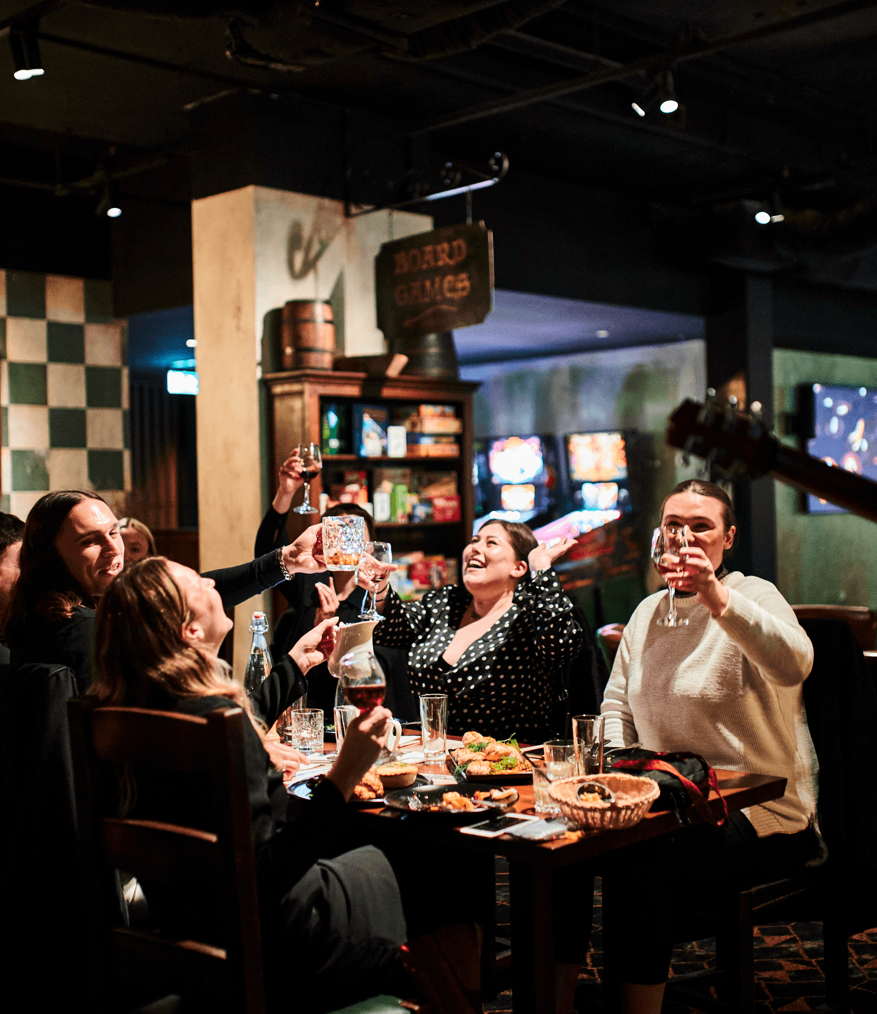 Friends eating a Heroes Feast in the Tavern at Fortress