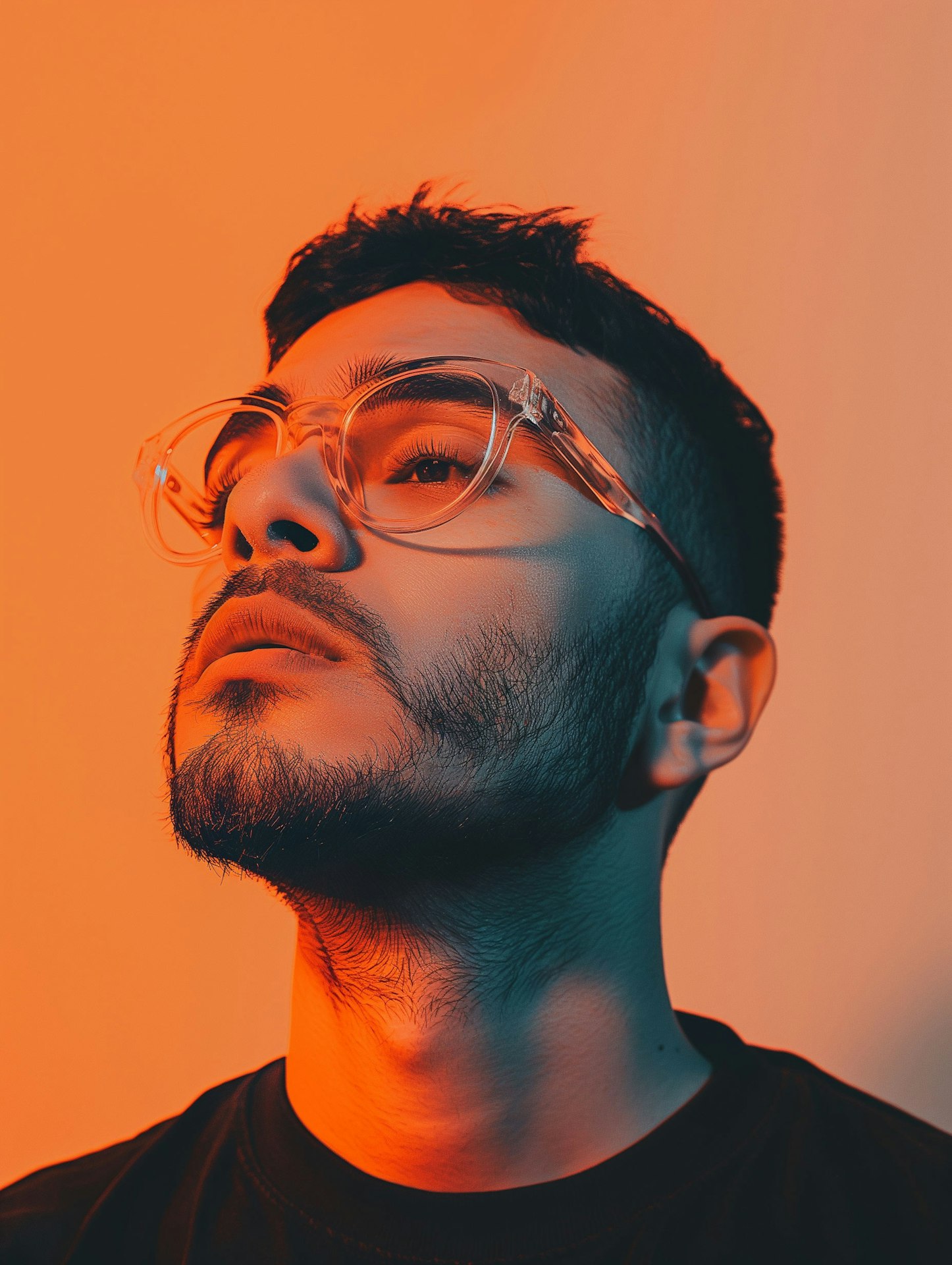 Portrait of a man in orange background