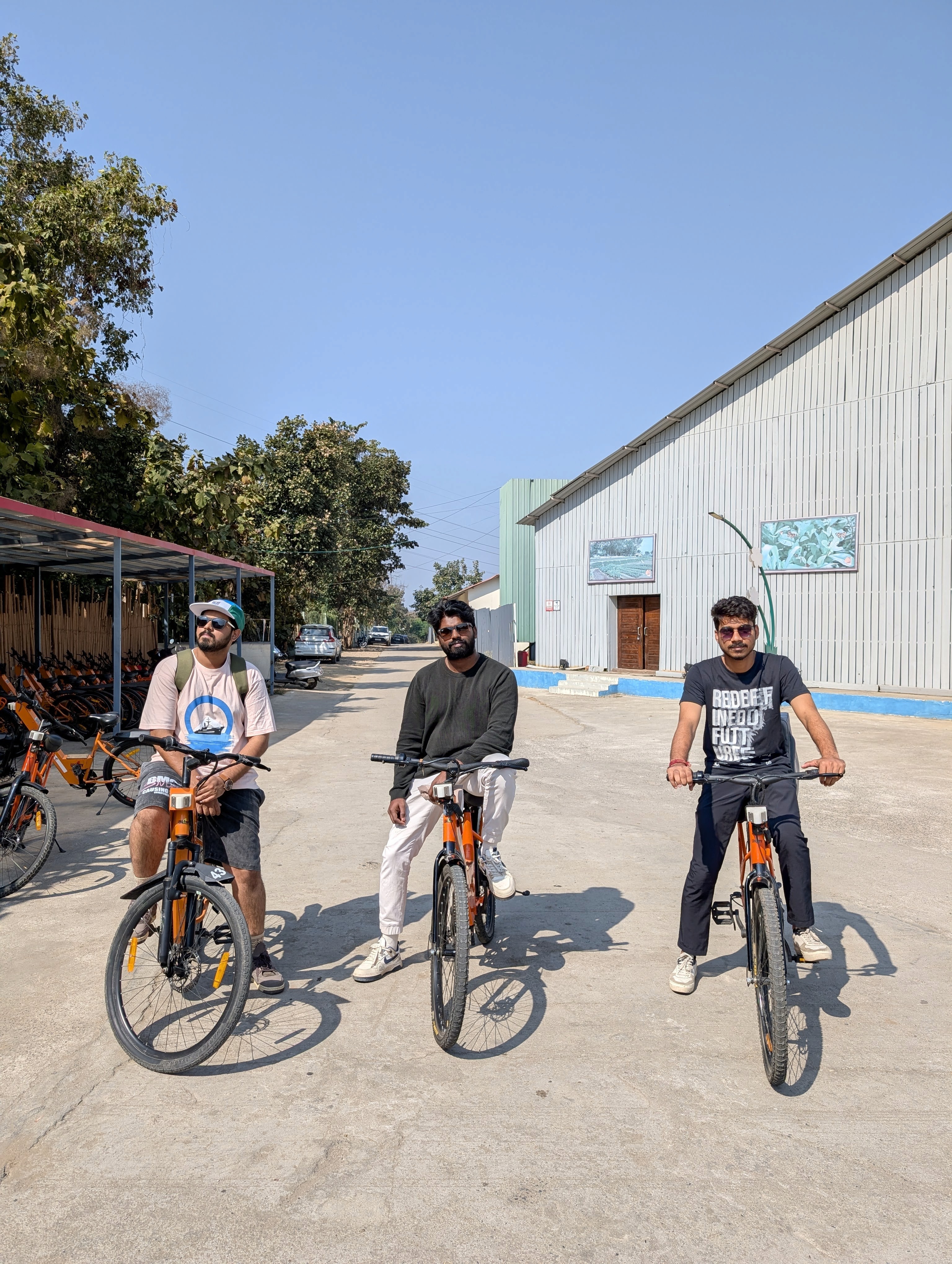 a group of people standing on top of a sandy beach
