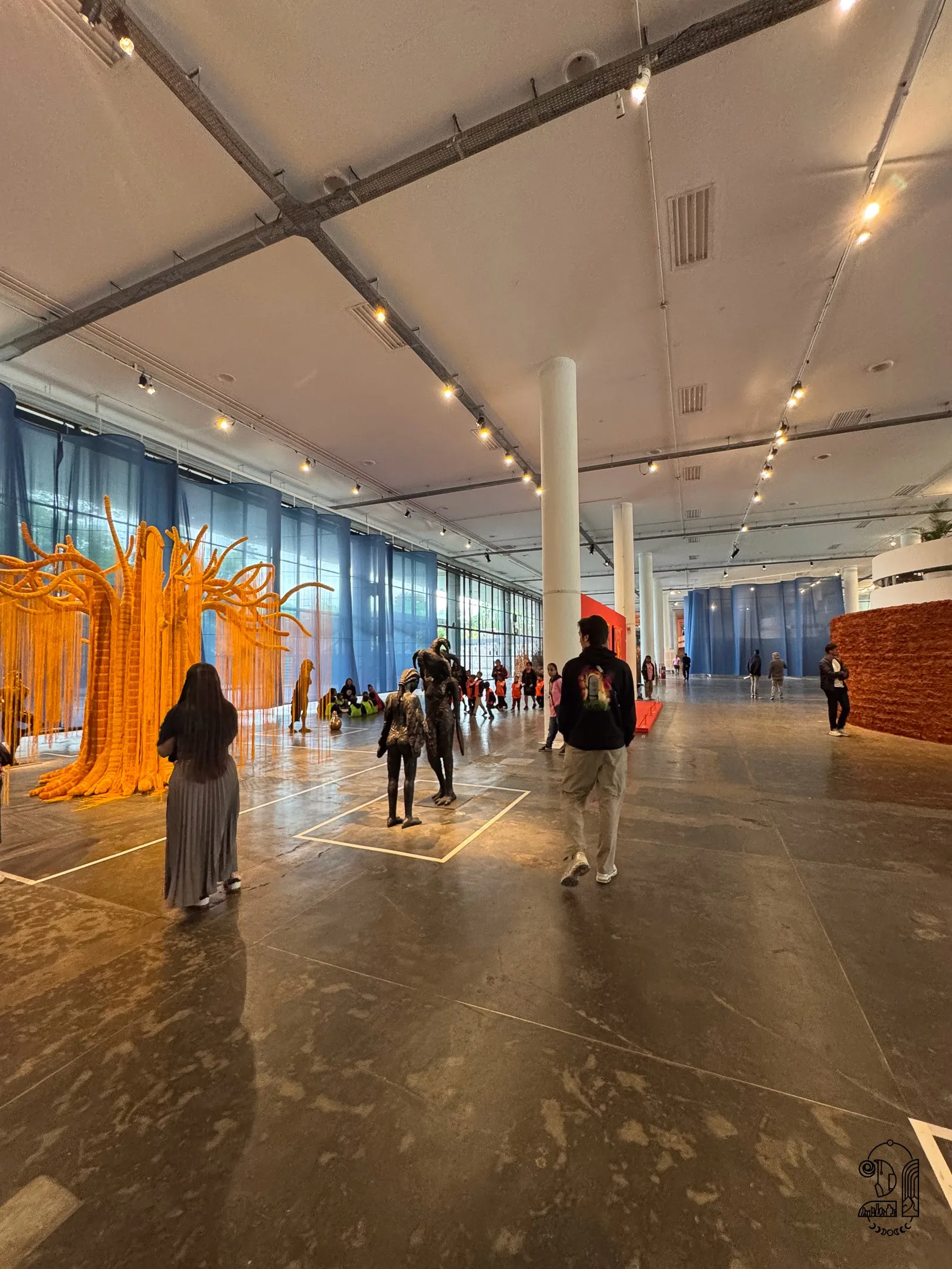 People strolling in an art foundation