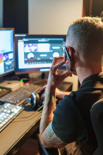 woman smiling and holding a dog