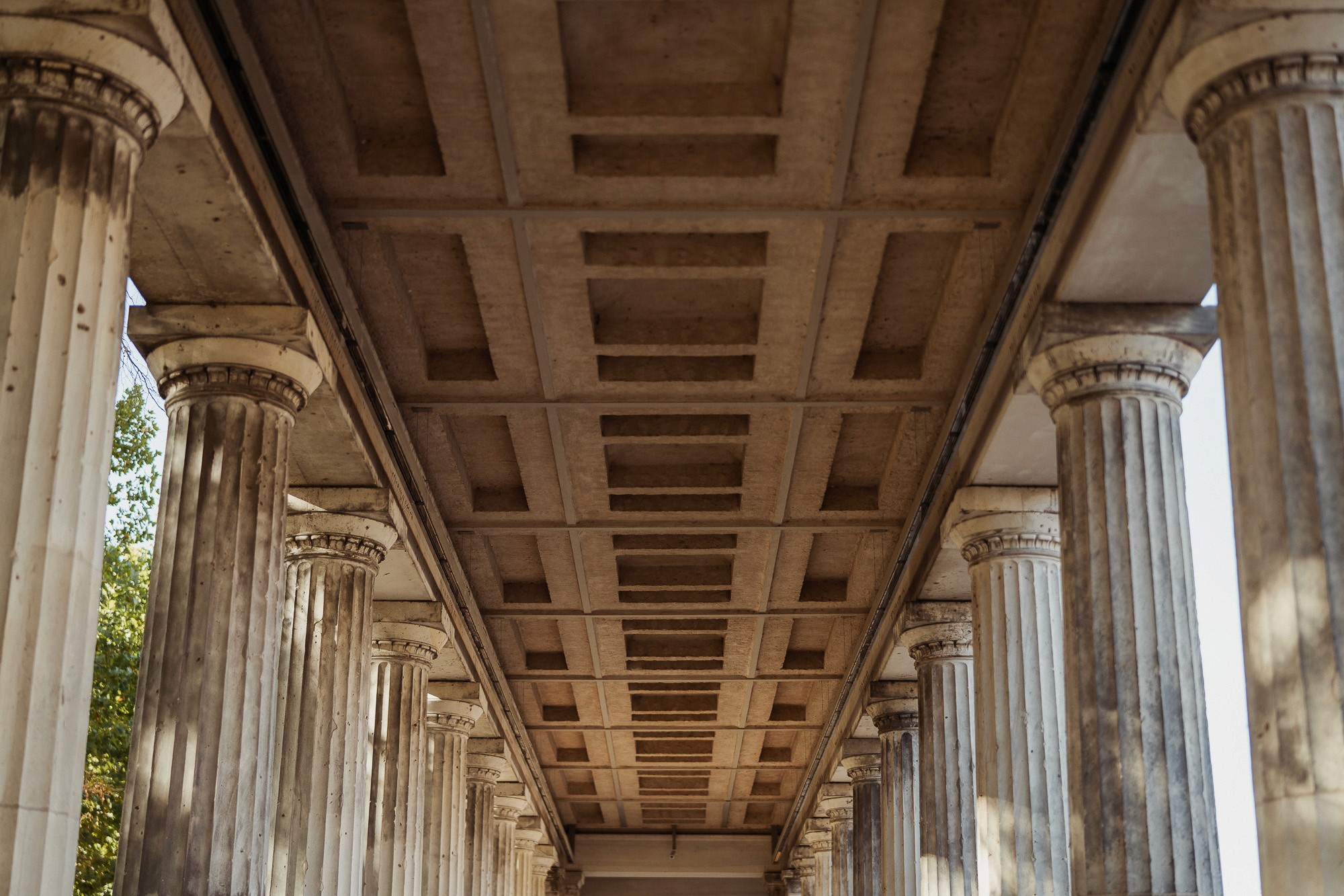 Architectural columns symbolizing the structural foundation behind the StoryOS narrative system