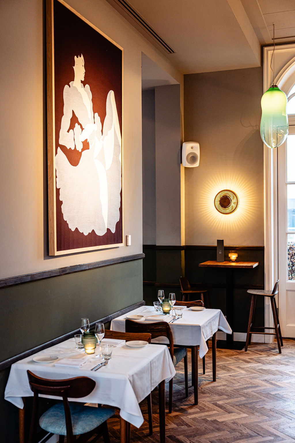 classy afternoon tea setup with macarons, roses and tea