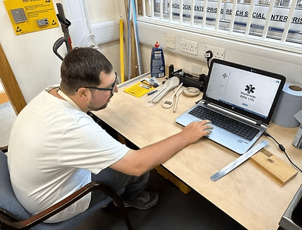A man standing with Sufboard