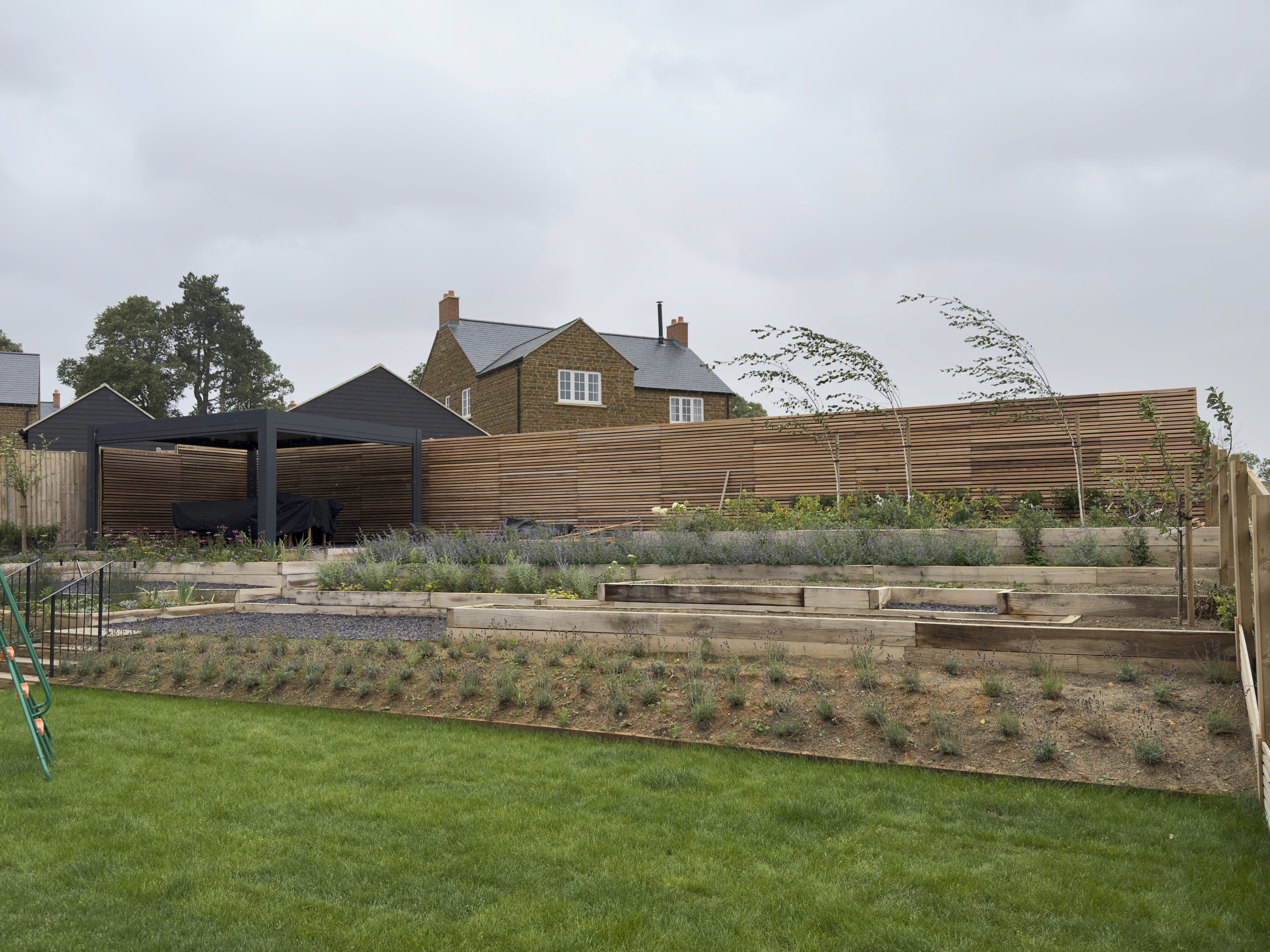 Timeless Oxfordshire garden with natural stone and planting by Wood&All