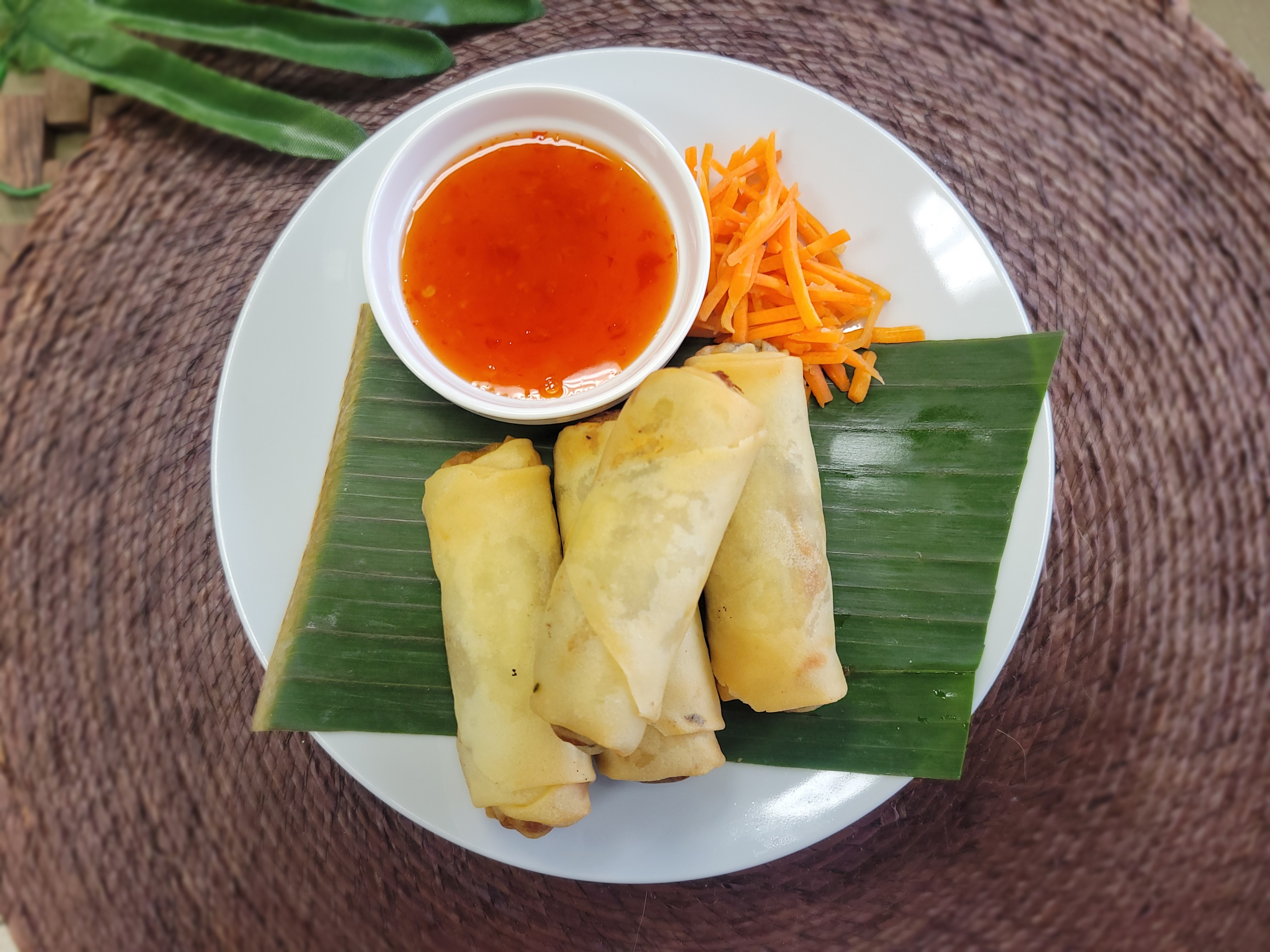 Freshly fried vegetable spring rolls served at Buddha Bruddah restaurant in Seattle – authentic Hawaiian-Thai fusion.