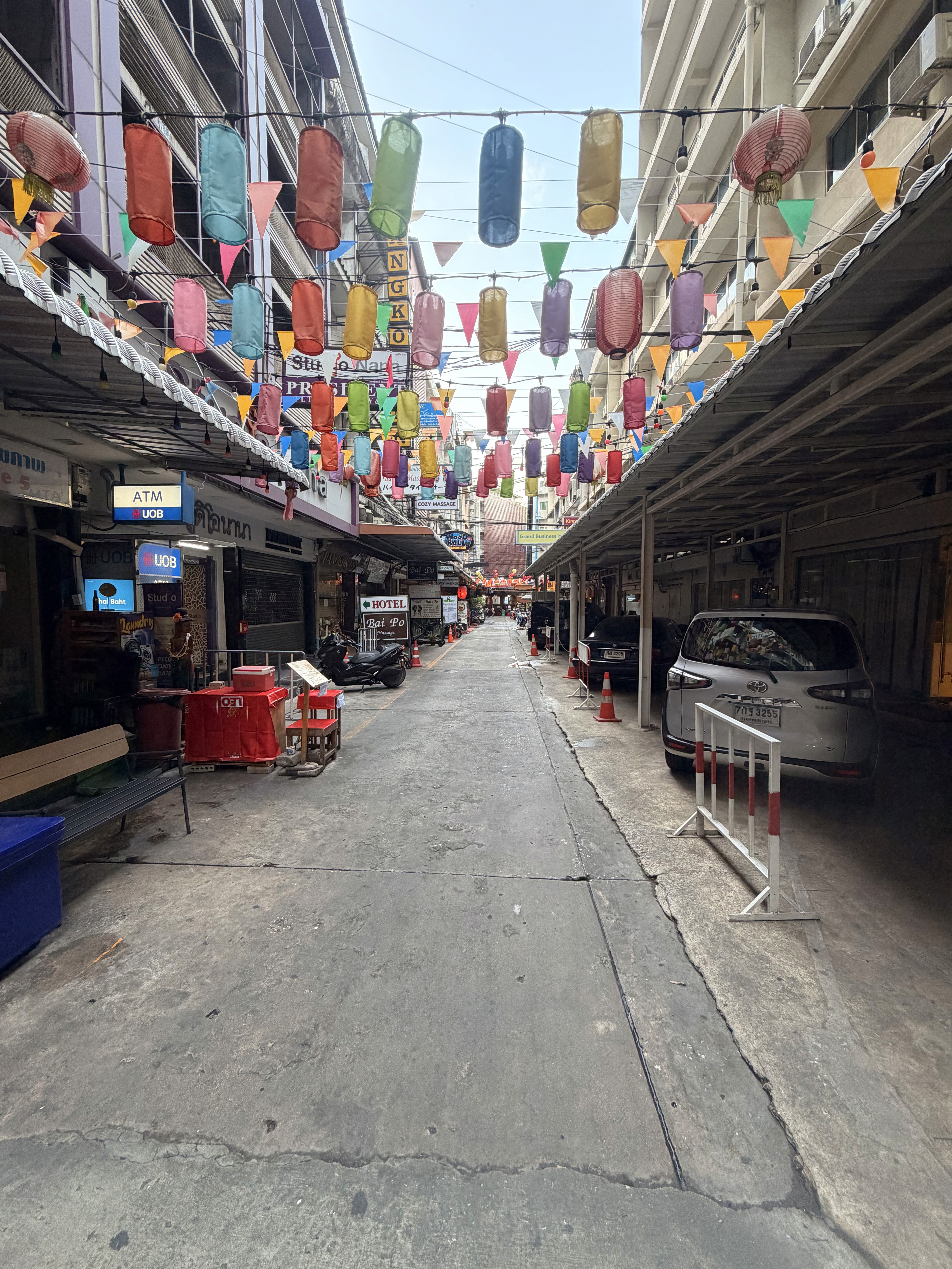 man wearing gray polo shirt beside dry-erase board
