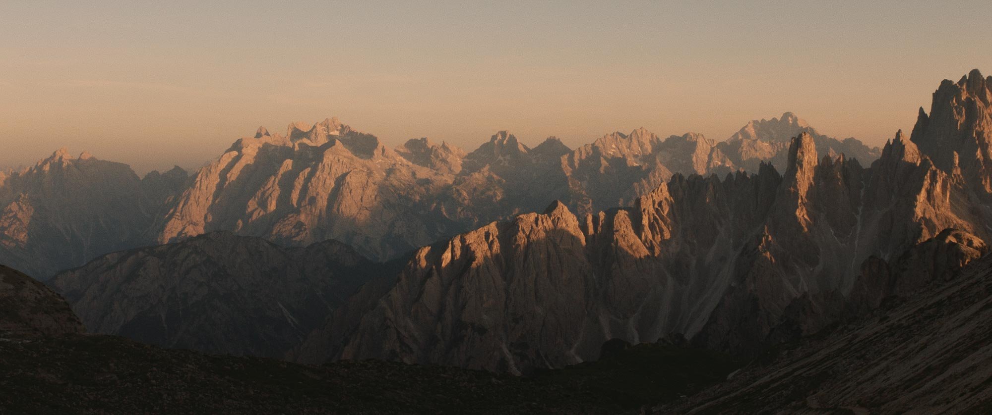 Streetside billboard with flyposters of the Batch.Works brand and illustrations