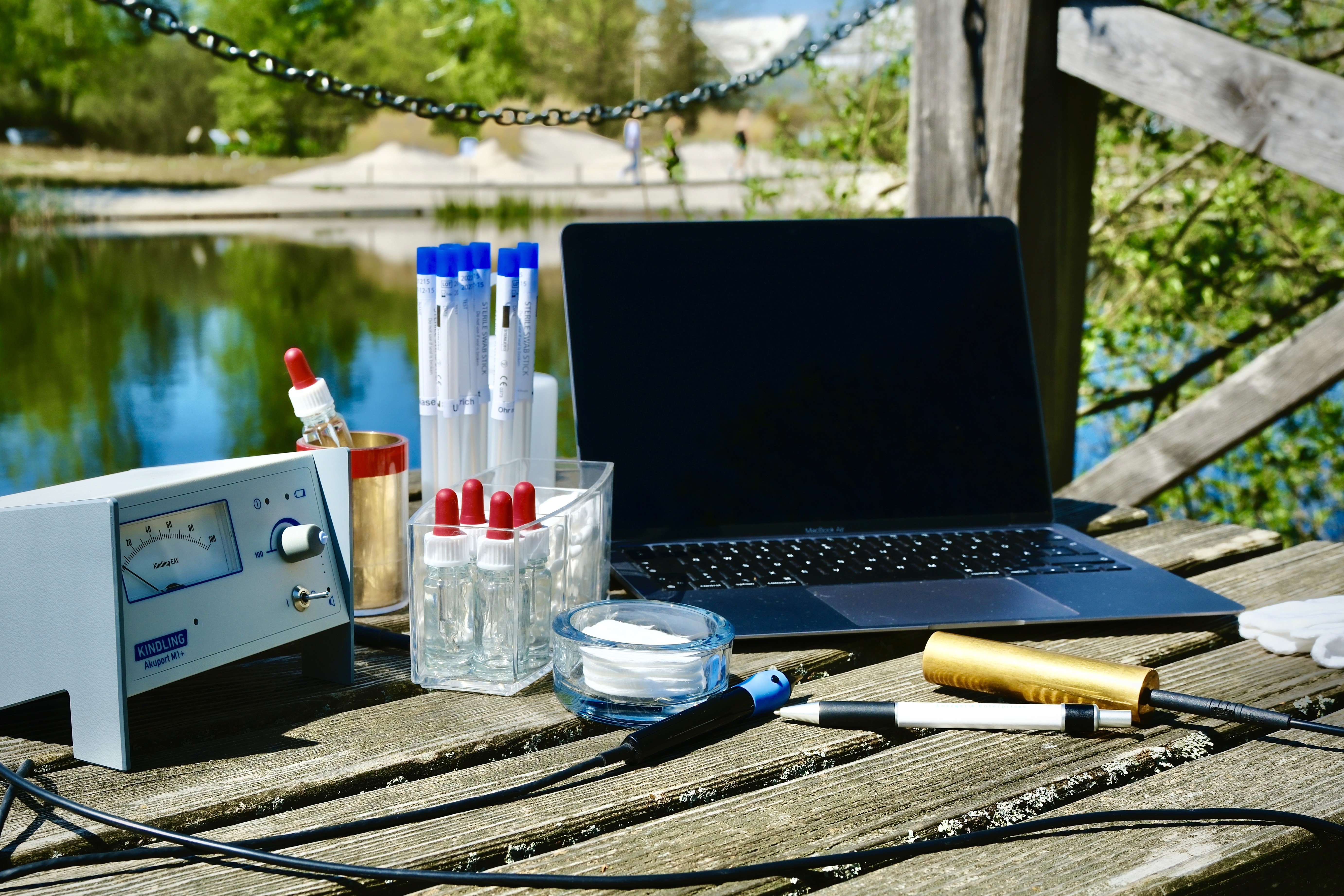 A luxurious indoor pool area with a panoramic view of a city at sunset. Comfortable lounge beds with soft fabrics surround the pool, while warm ambient lighting enhances the sophisticated atmosphere. The space combines modern elegance with a tranquil vibe.