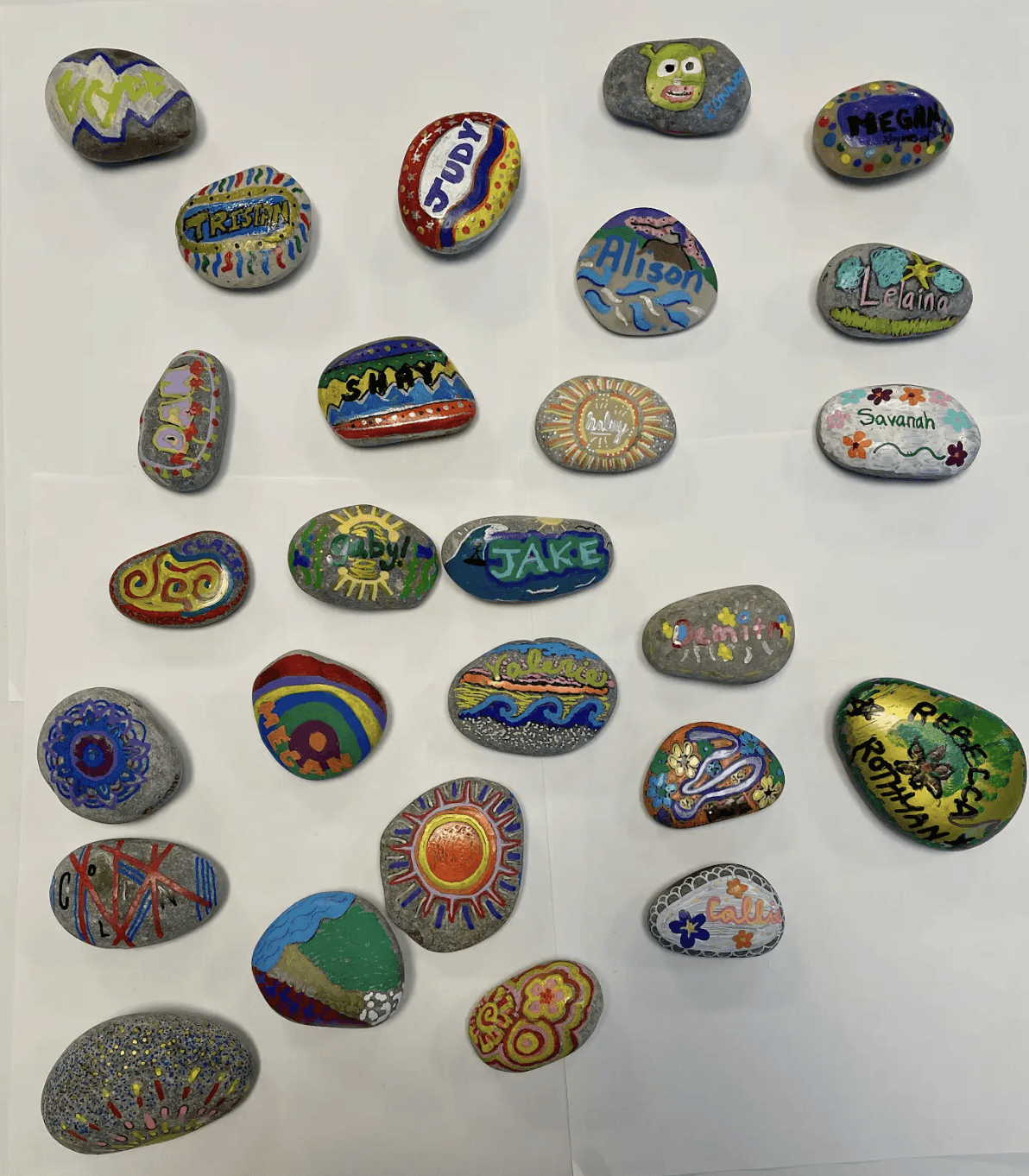 Painted rocks from a facilitated group activity in San Francisco, CA