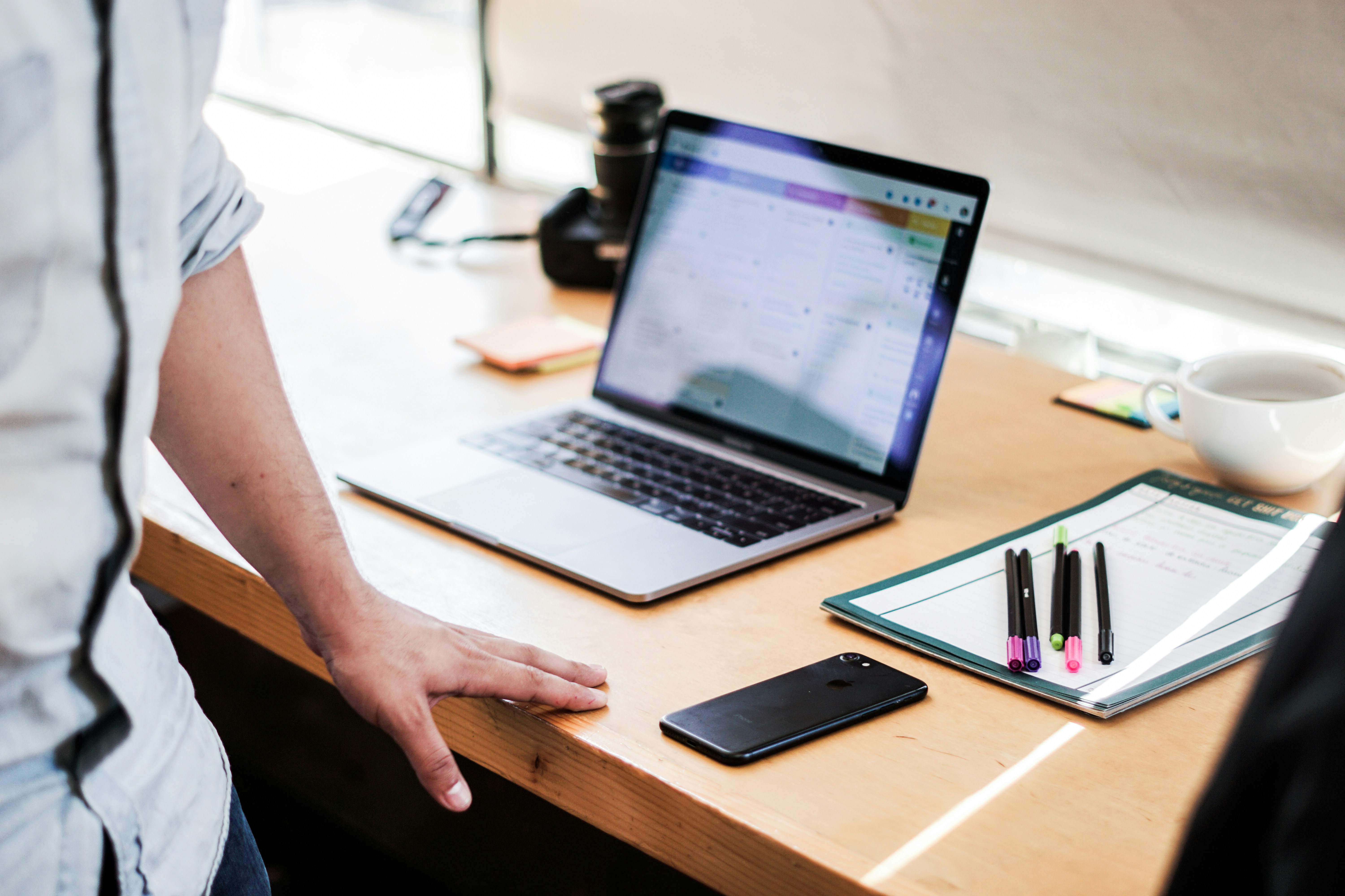 person on his work desk using AI Excel Formula Generator