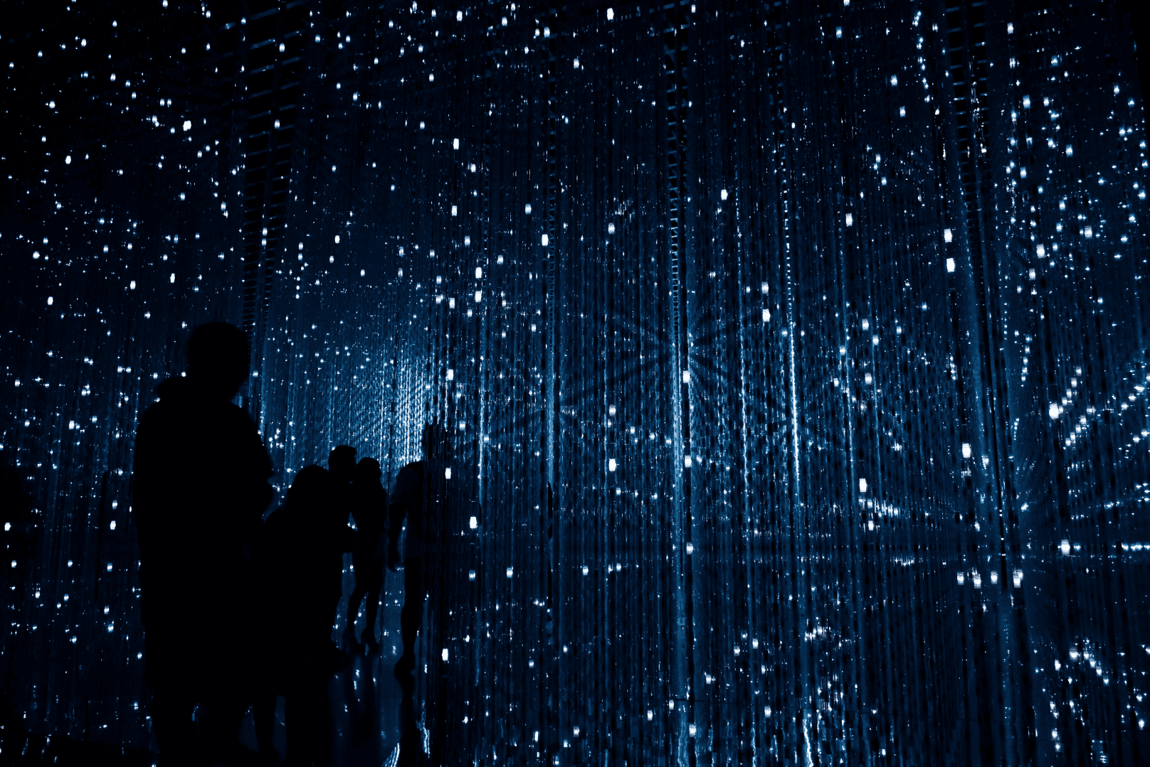 a group of people standing next to each other