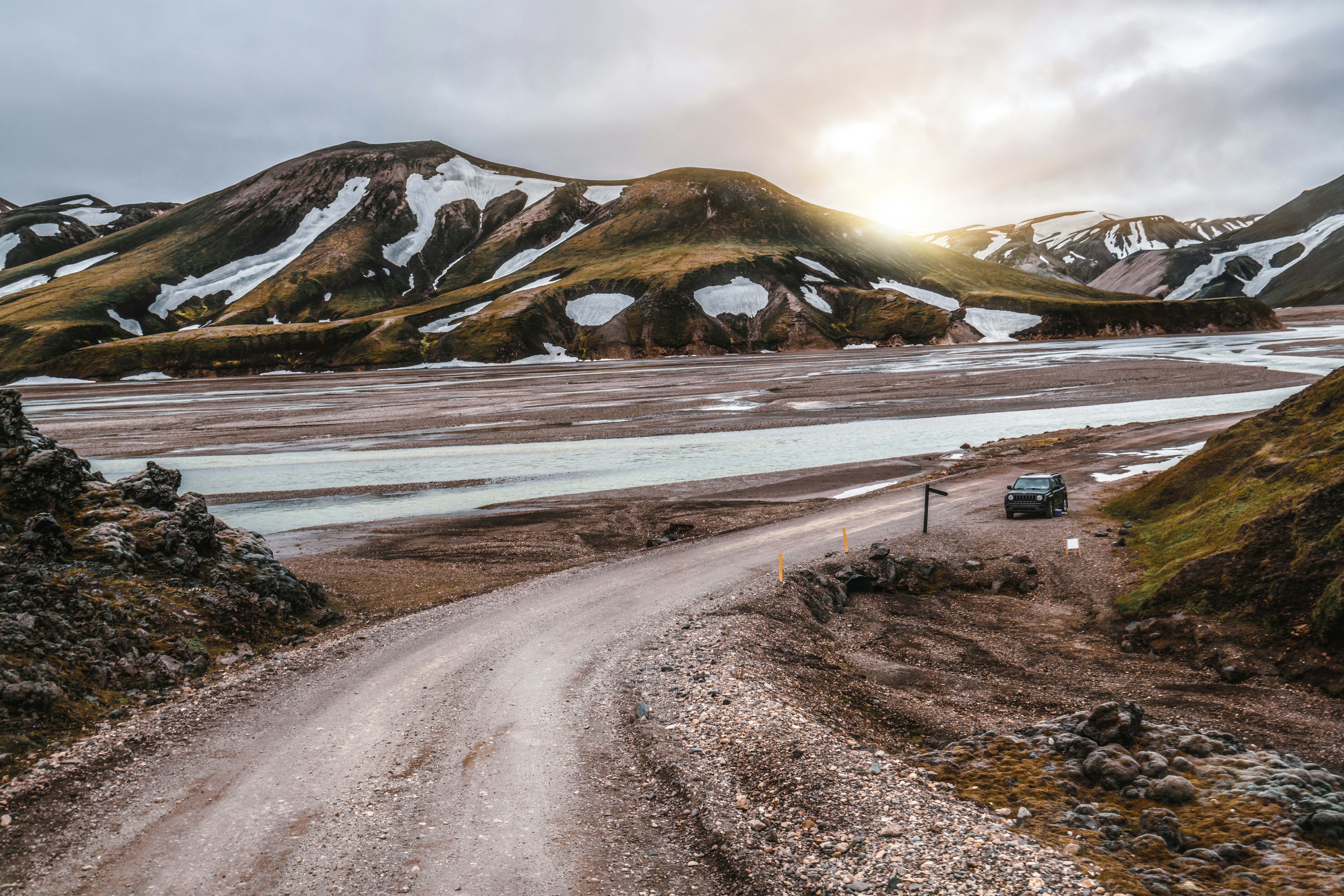 Off-road vehicle driving through Landmannalaugar in South Iceland.