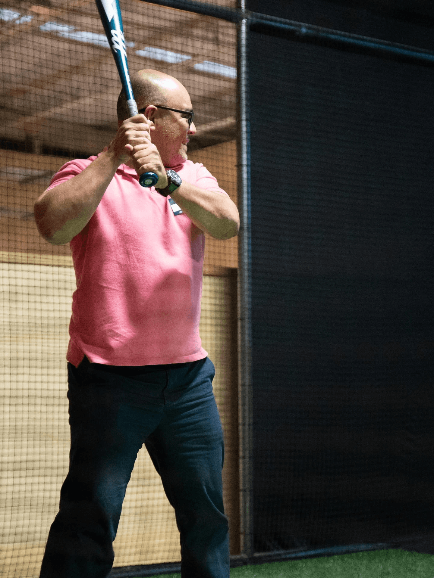 Man batting at Kingpin Social with HitTrax Suite