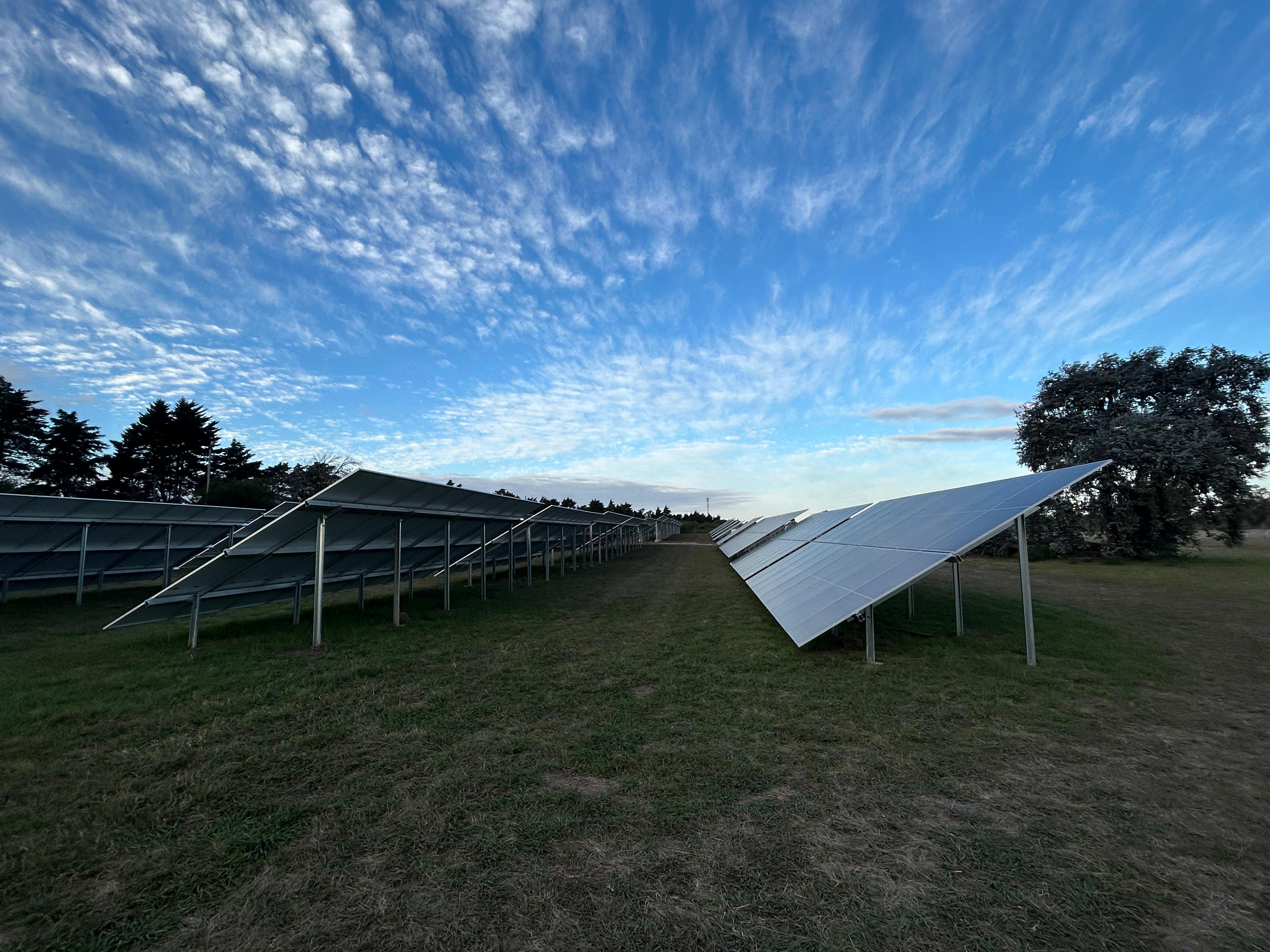 two people setting and using laptop