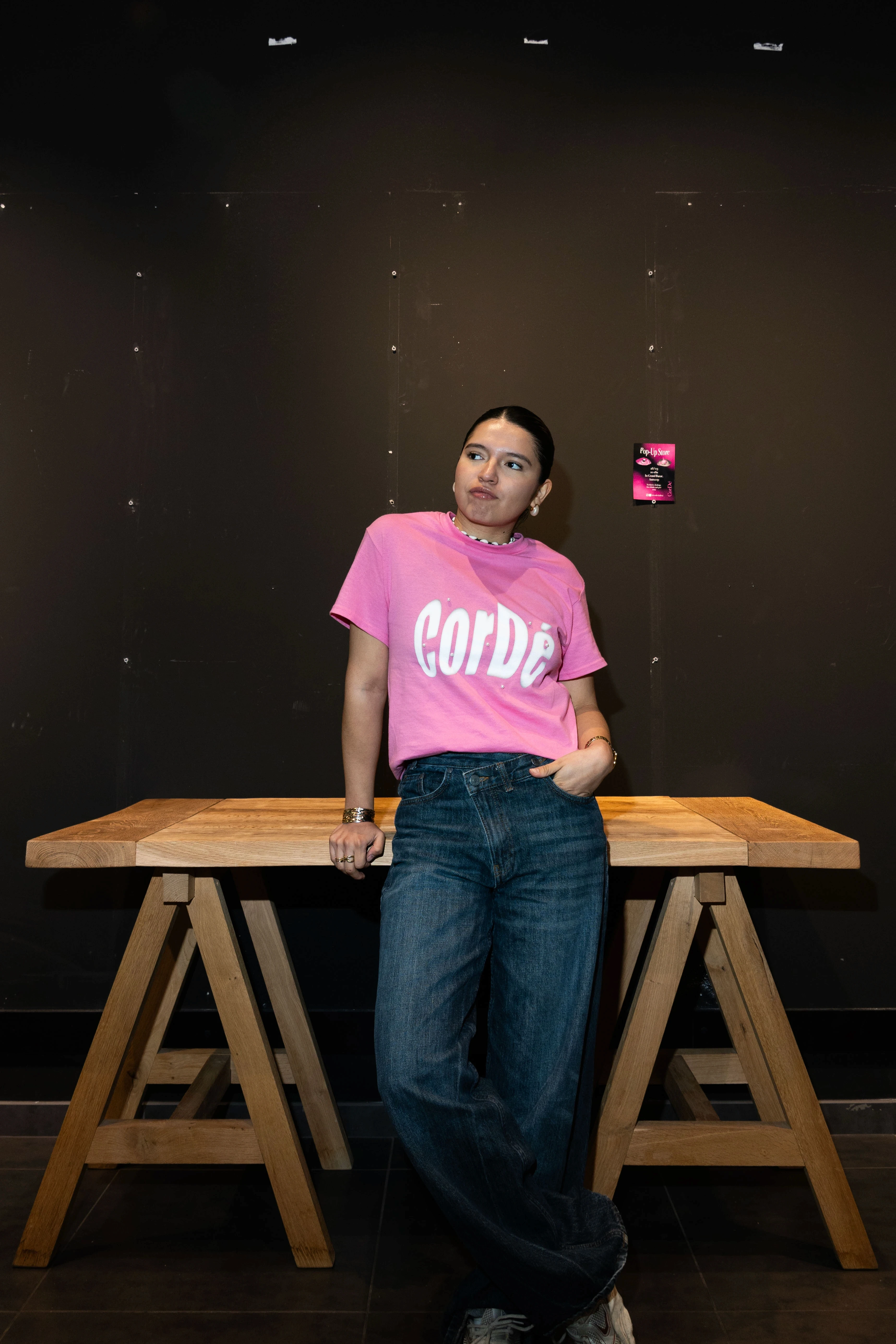 Model wearing the CorDé Logo Tee in pink
