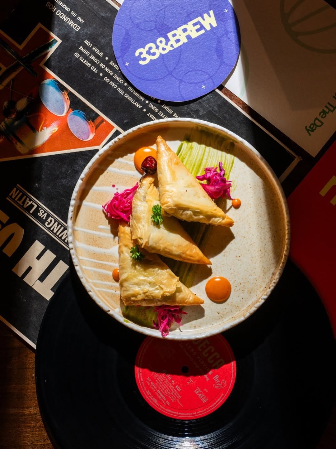 Batch.Works product catalogue book on a work top with a graphic printed image on the front