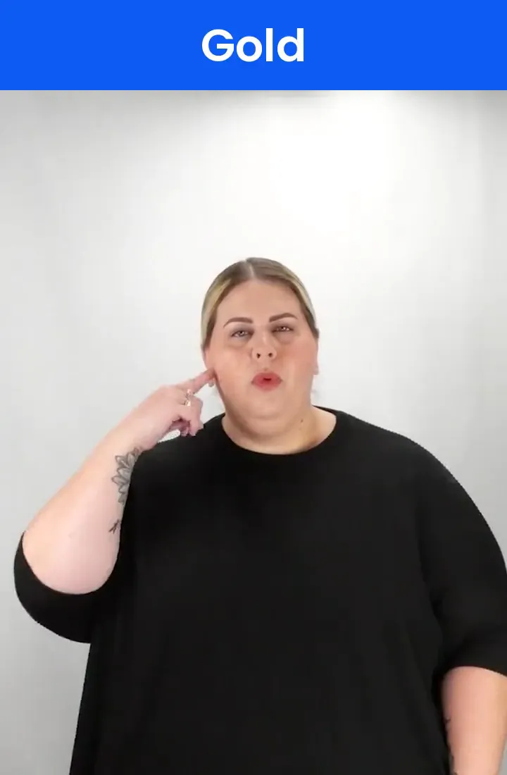 A Deaf signer signs GOLD in ASL