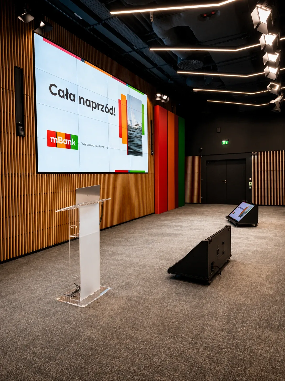 mBank ISO conference, stage with a lectern and an LED screen