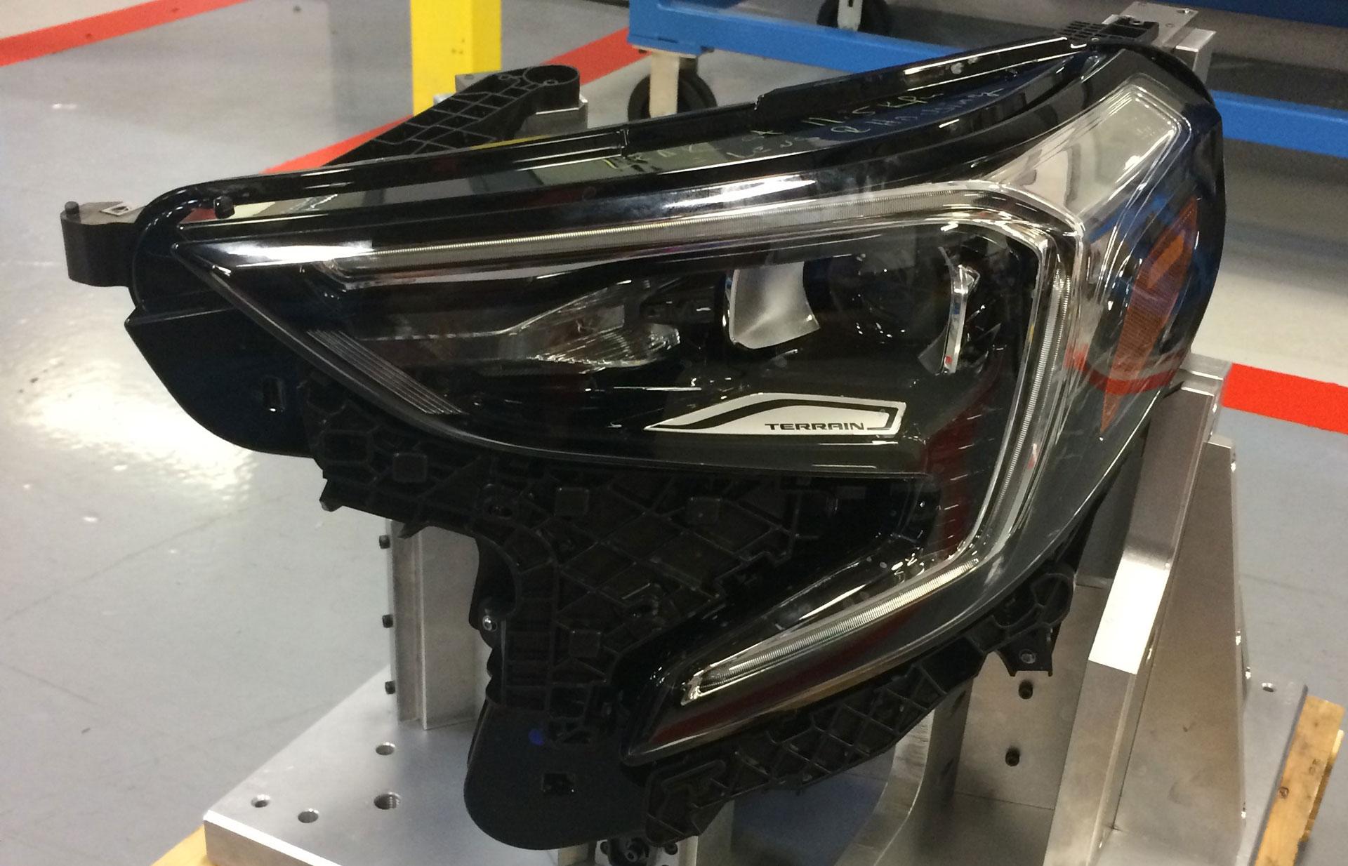 Automated finishing system with precision lighting and aim control