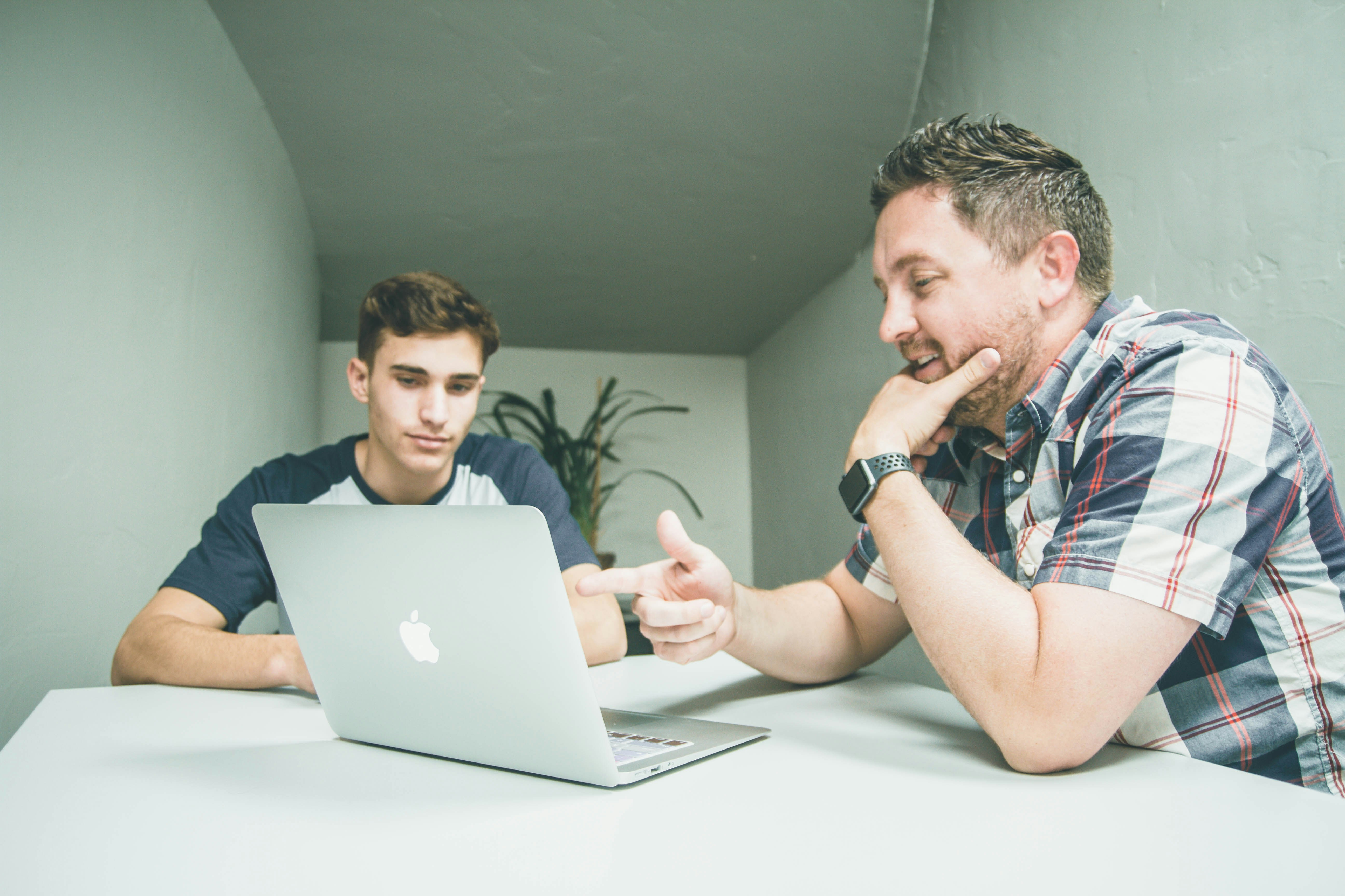 two men discussing - ADHD Task Management Apps 