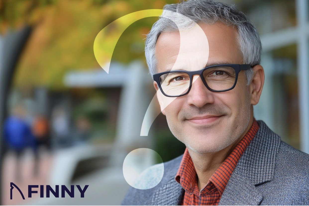 Smiling older man with glasses and a large question mark overlay