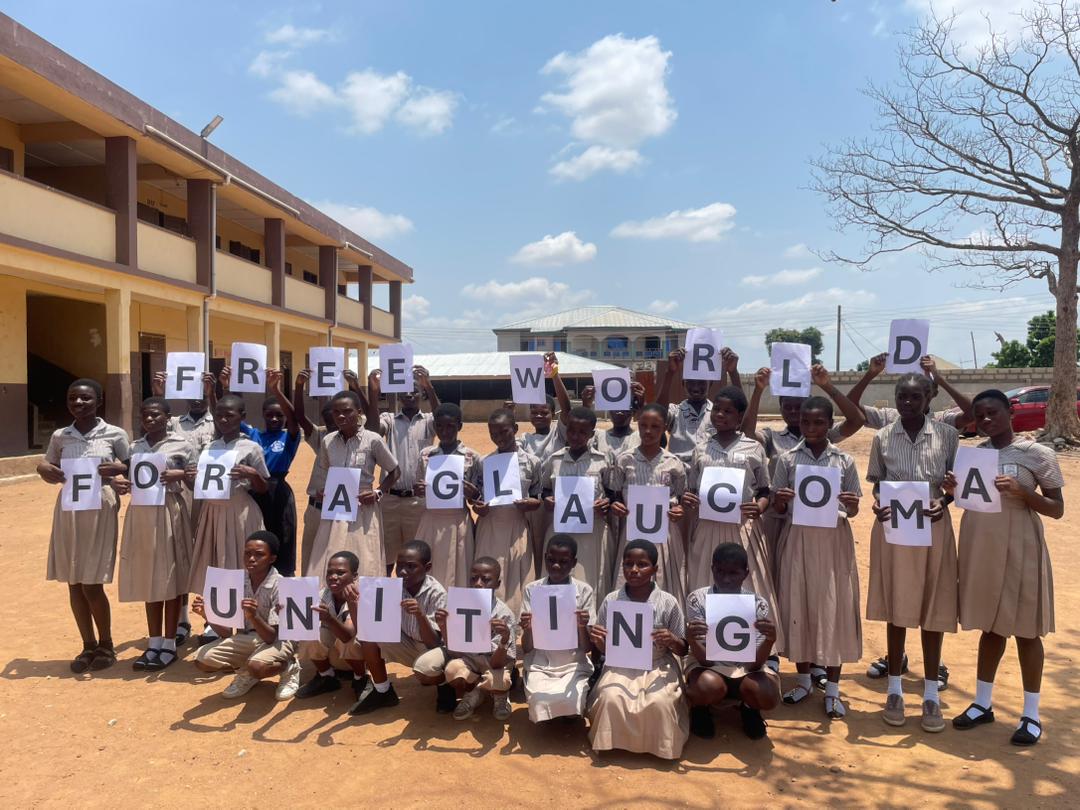 man in gray dress shirt holding black camera