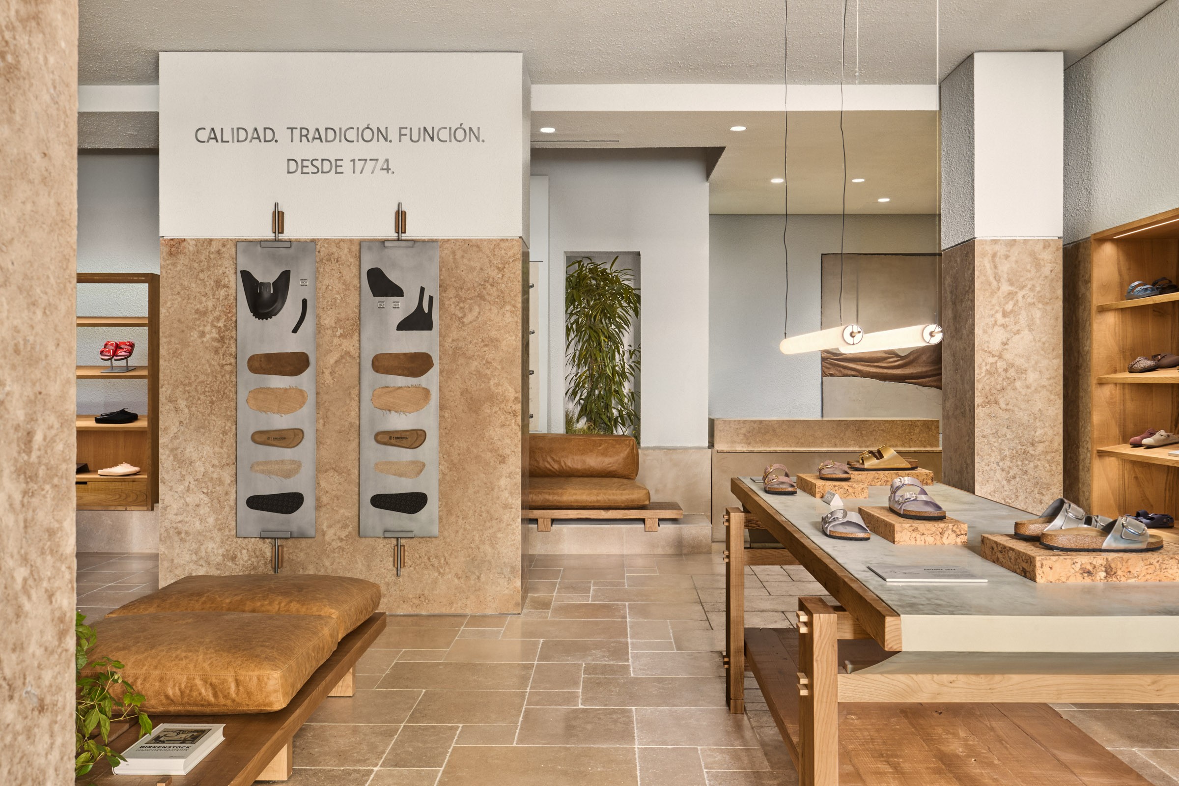 Entrance and seating area inside the Birkenstock store in Madrid designed by Matteo Ferrari.
